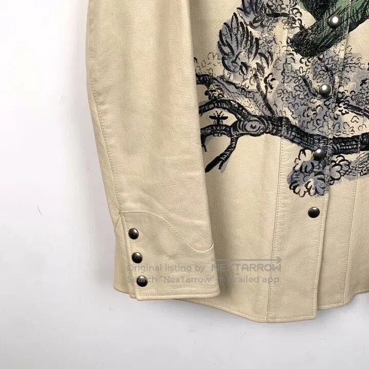 christian dior beige monkey print leather jacket.