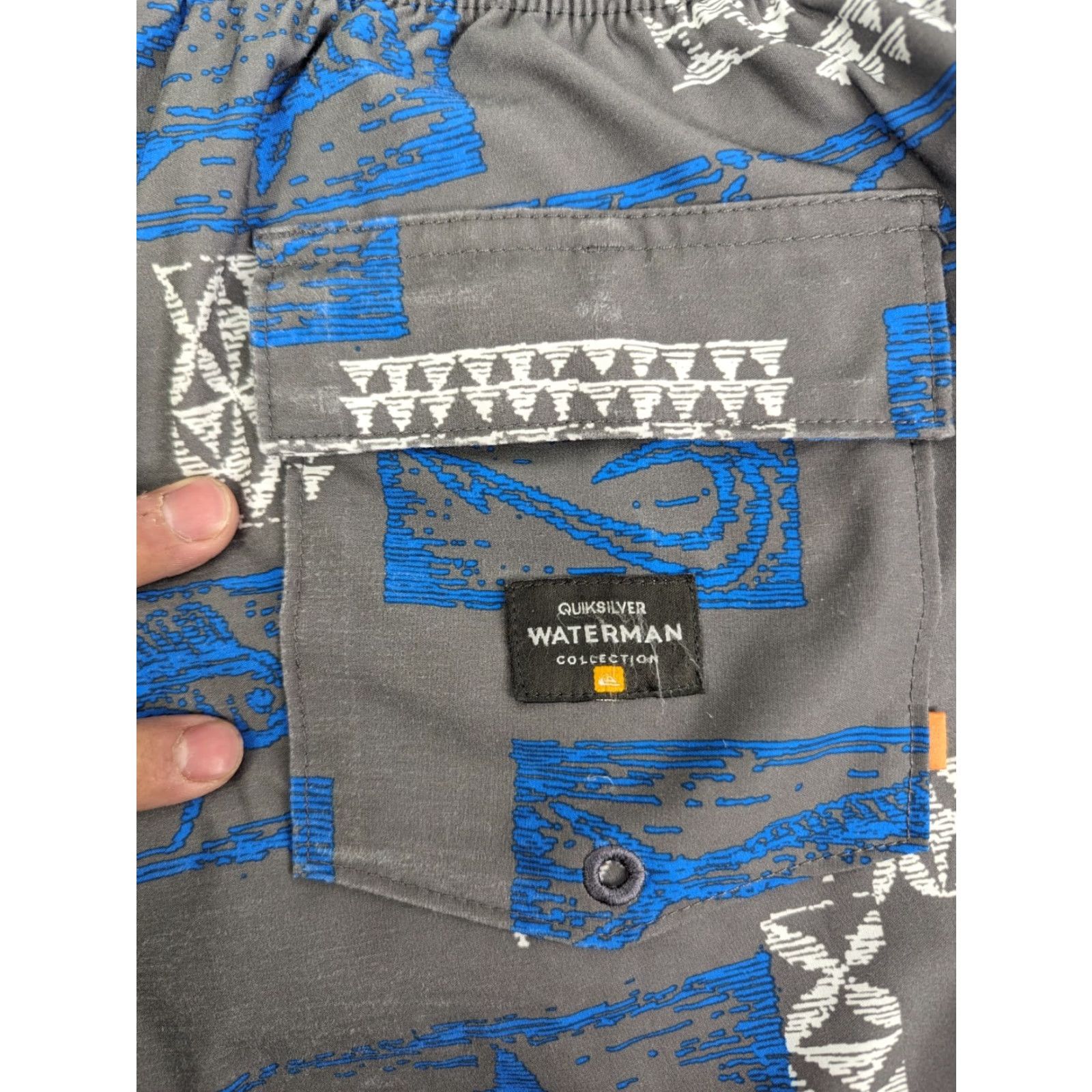 Quiksilver Quiksilver Waterman Hopu Aina Men’s Medium Swim Trunks Lined Drawstring Pockets Blue Trunks Beach Hawaii Aloha Surf Ocean Waves Pattern AOP Size ONE SIZE - 3 Thumbnail