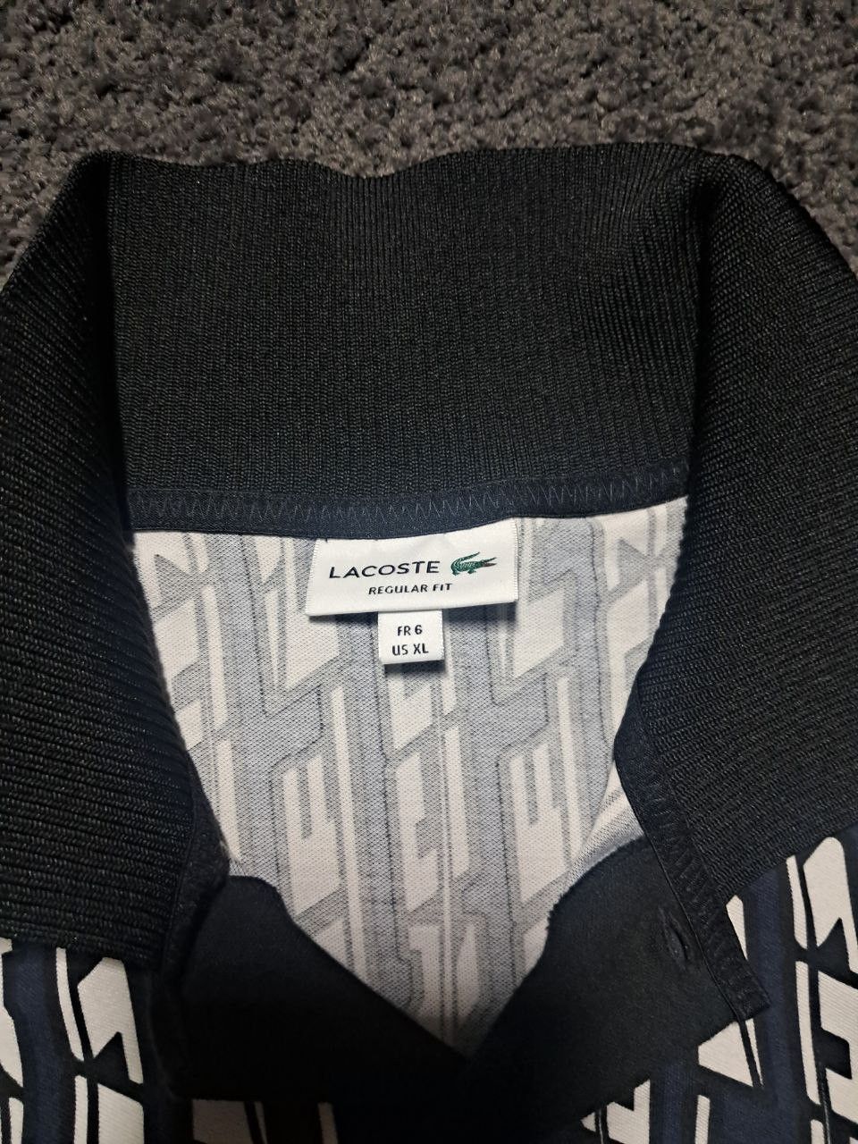Lacoste Full name: Men’s Navy & White Geometric Print Polo Size US XL / EU 56 / 4 - 6 Thumbnail