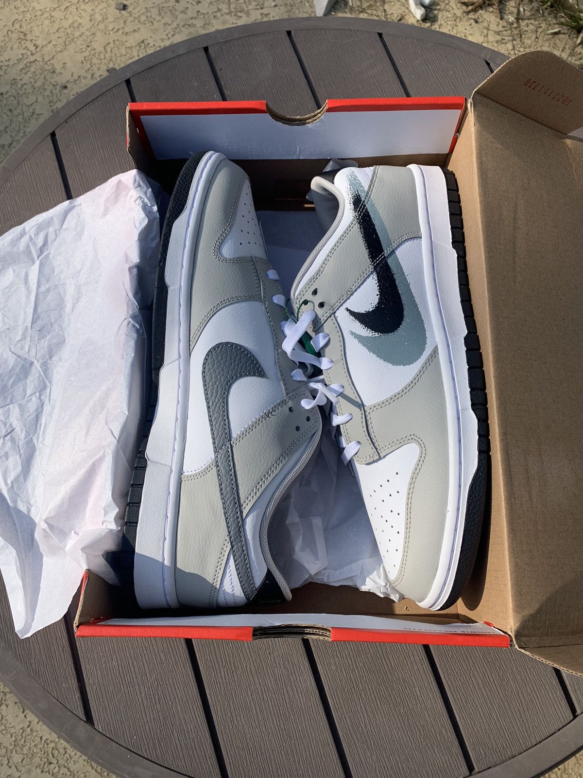 image of Nike Dunk Low Stencil Swoosh Shoes in Grey, Men's (Size 12)
