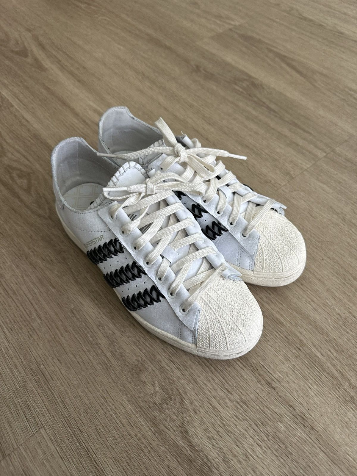 adidas gazelle silver green womens Adidas x Foot Industry Unisex Superstar White / Black Low Top Sneakers main image 1