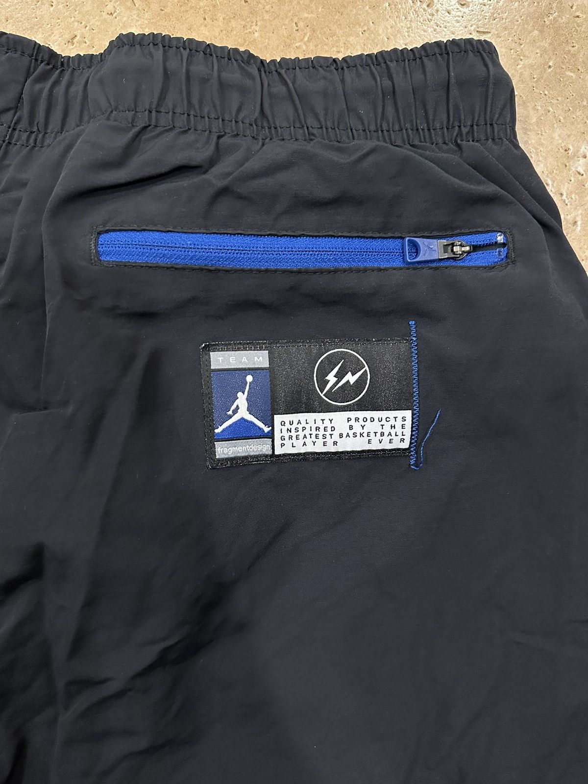 Fragment Design × Jordan Brand Jordan Brand x Fragment Design Woven Nylon Black/Blue Pants Size US 34 / EU 50 - 11 Thumbnail