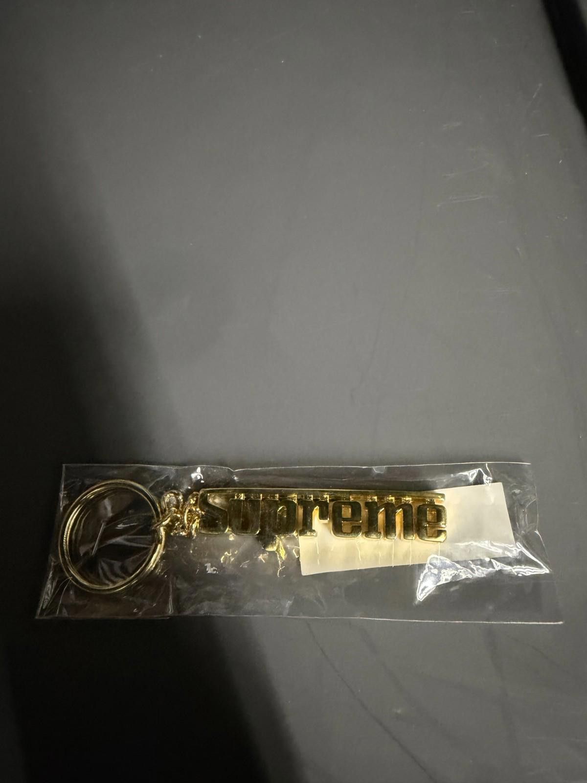 Supreme Gold Grand Prix Keychain FW16