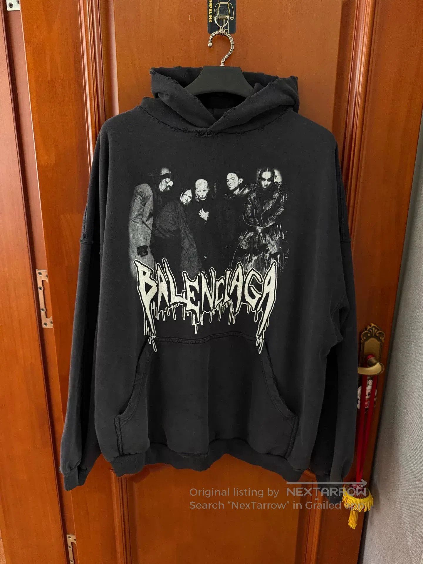 balenciaga black hoodie with graphic design.