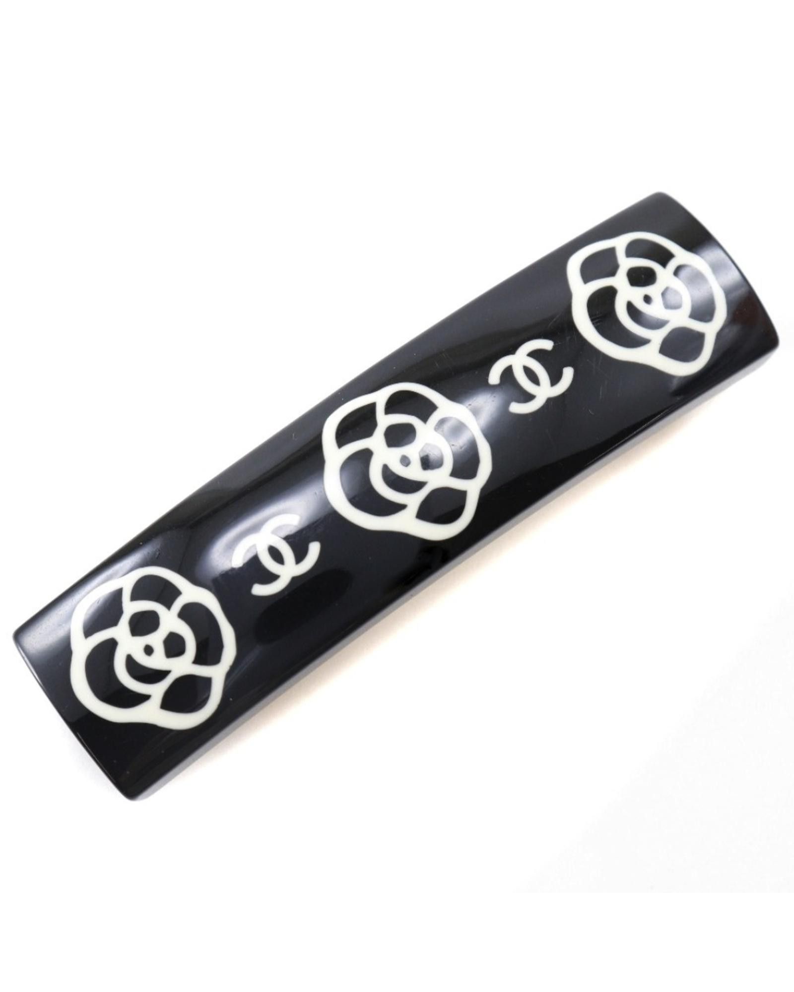 image of Chanel Camellia Barrette - Timeless Elegance in Black, Women's