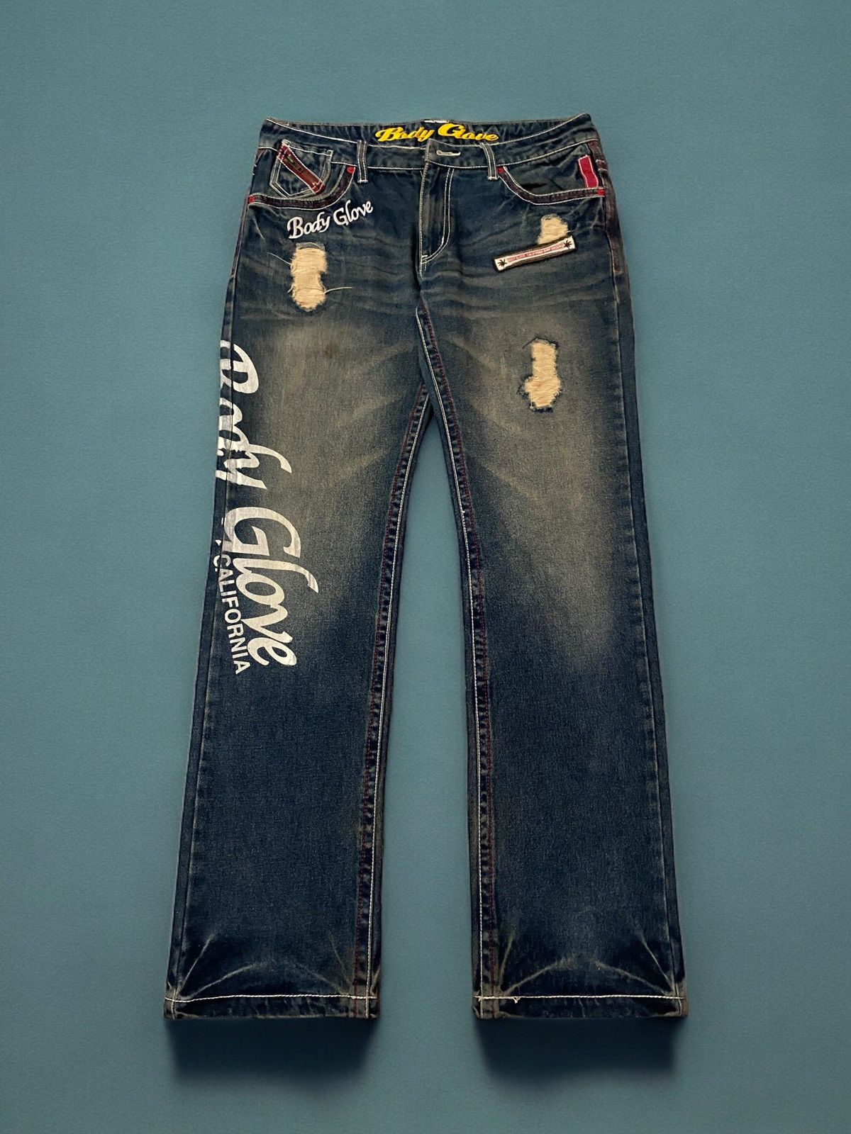 image of Vintage Body Glove Surf Groove Emberoided Patches Jeans in Blue, Men's (Size 34)