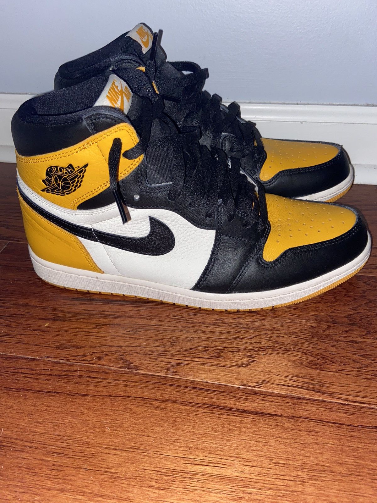 image of Jordan Brand 1 High Taxi Shoes in Yellow/Black, Men's (Size 11)