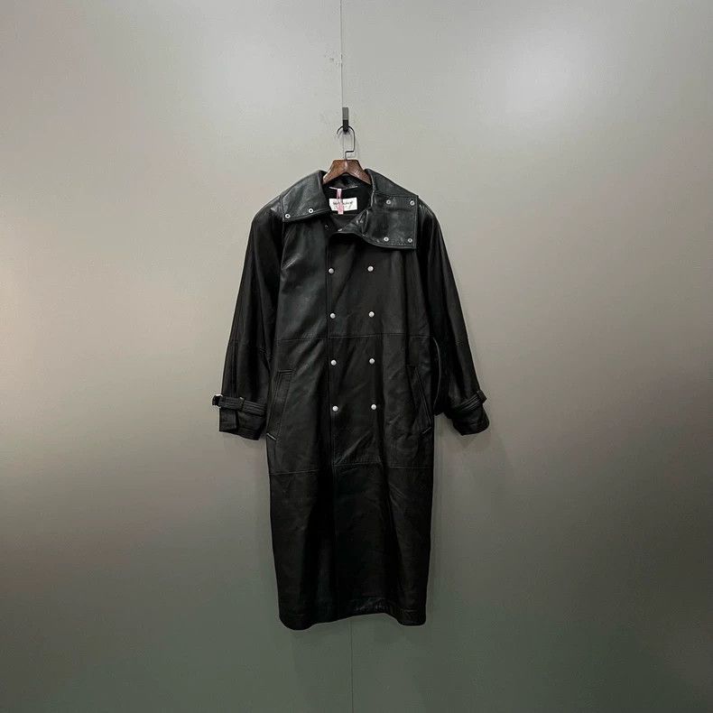 black double-breasted leather coat by saint laurent