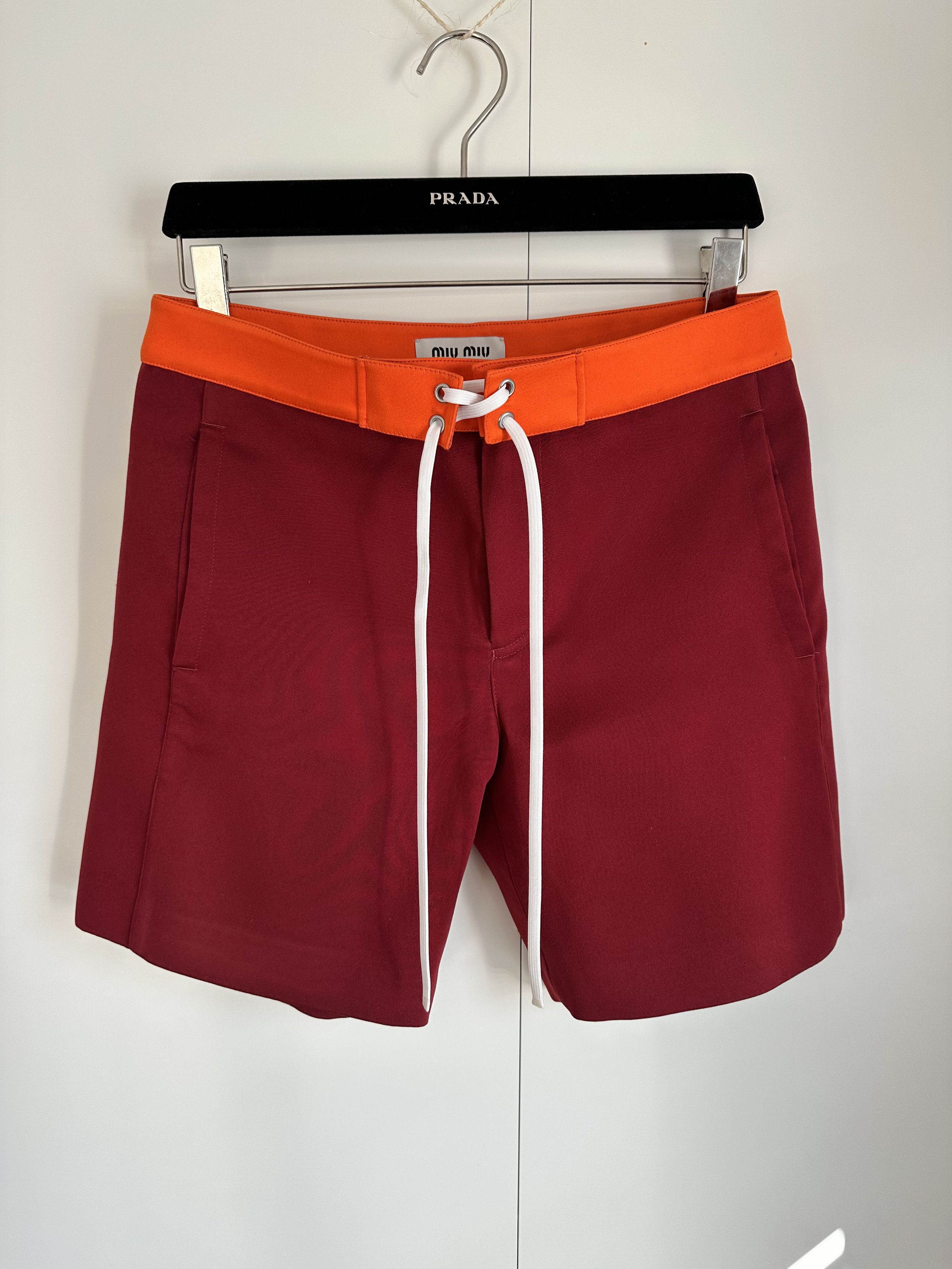 Miu Miu From the SS24 runway contrasting-waistband shorts $ 1,820 Size 30" / US 8 / IT 44 - 4 Thumbnail