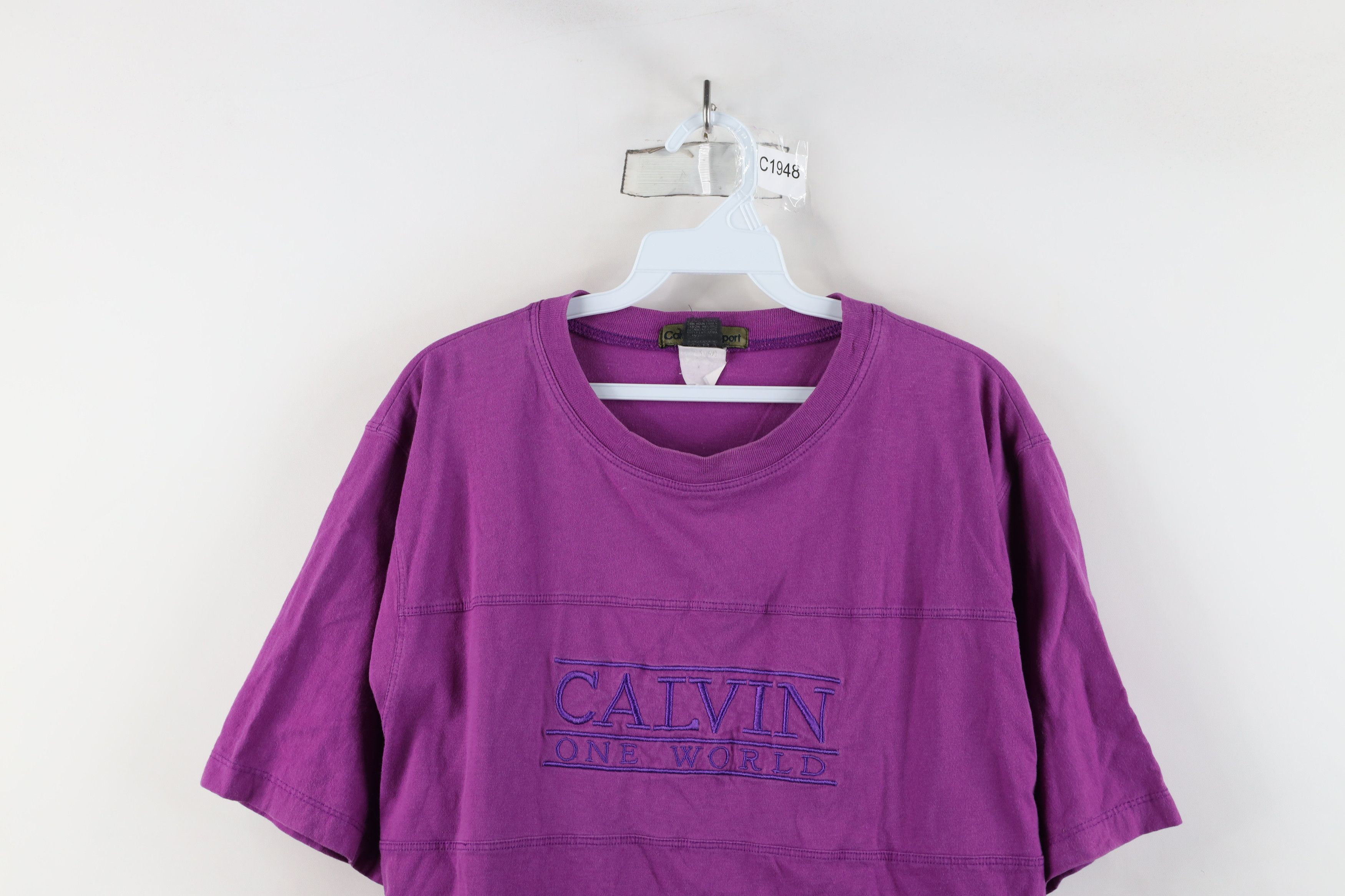 Calvin Klein × Vintage Vintage 90s Calvin Klein Spell Out One World T-Shirt Purple Size XXL / US 16-18 / IT 52-54 - 2 Thumbnail