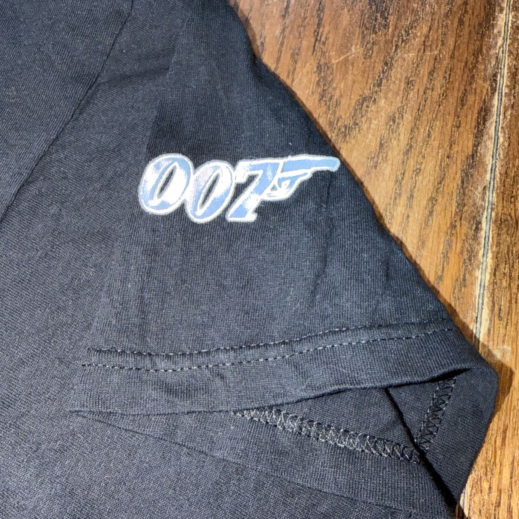 Vintage VINTAGE James Bond 007 The World Is Not Enough Movie Promo T Shirt XL Blue Grape 1999 Size US XL / EU 56 / 4 - 5 Thumbnail