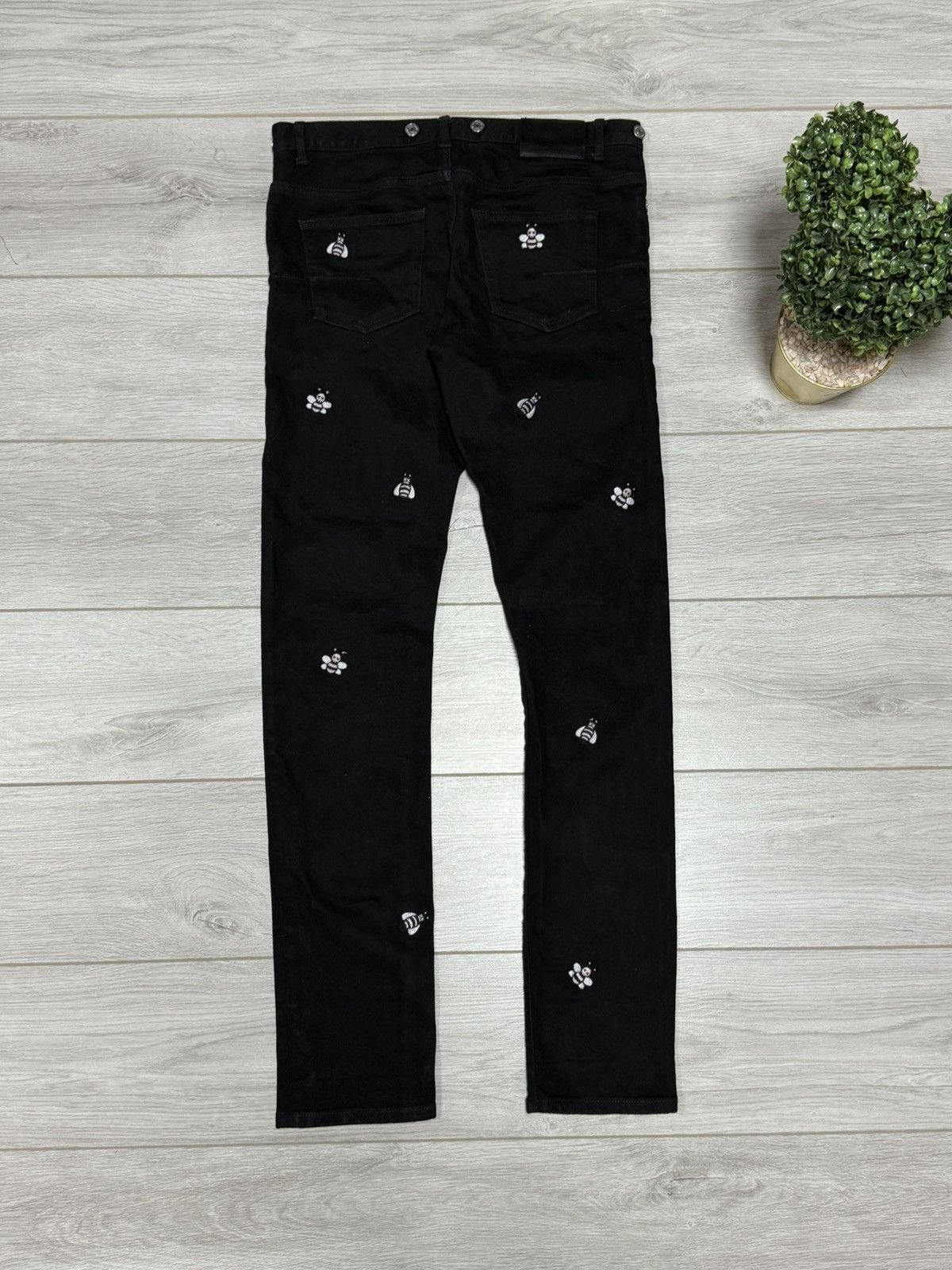 Dior × Kaws Dior x Kaws bugs slim jeans pants all over buttons Size US 33 - 15 Thumbnail