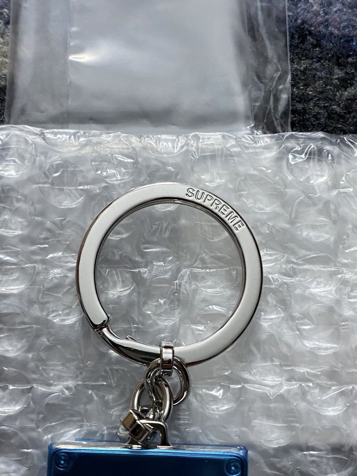 Supreme Supreme Puzzle Keychain Silver | Grailed
