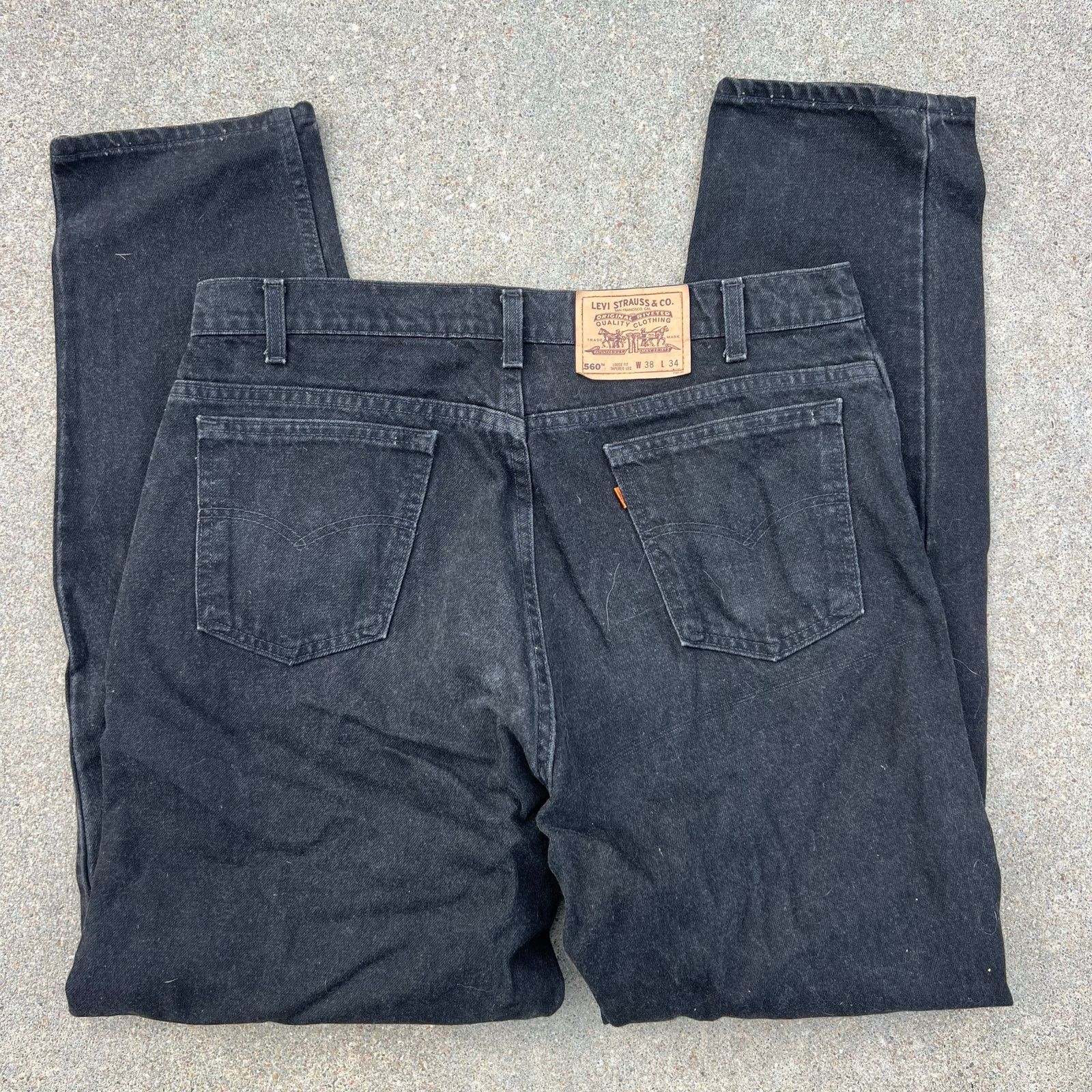 90s Levi's 560 Orange Tab Black Loose Fit Tapered Jean 38x34