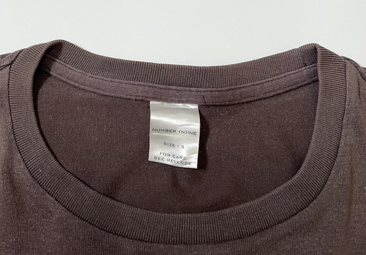 Number (N)ine Number (n)ine FW02 “nowhere man” E tee Size US S / EU 44-46 / 1 - 5 Thumbnail