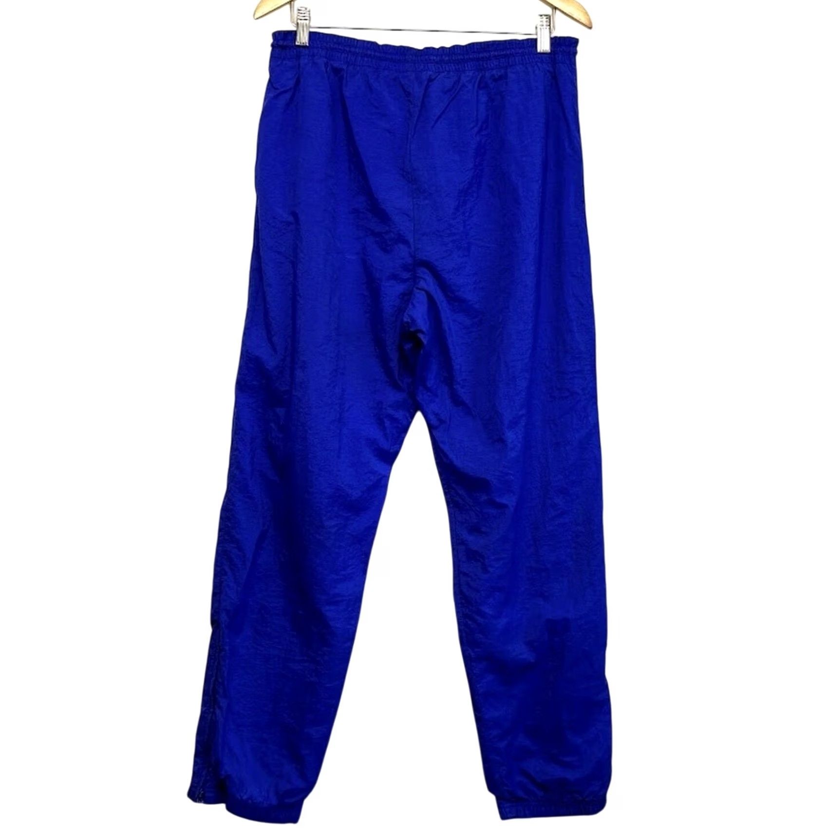 Nike VINTAGE Nike Track Pants M Blue Nylon Windbreaker Ankle Zip Embroidered Swoosh Size US 31 - 2 Thumbnail