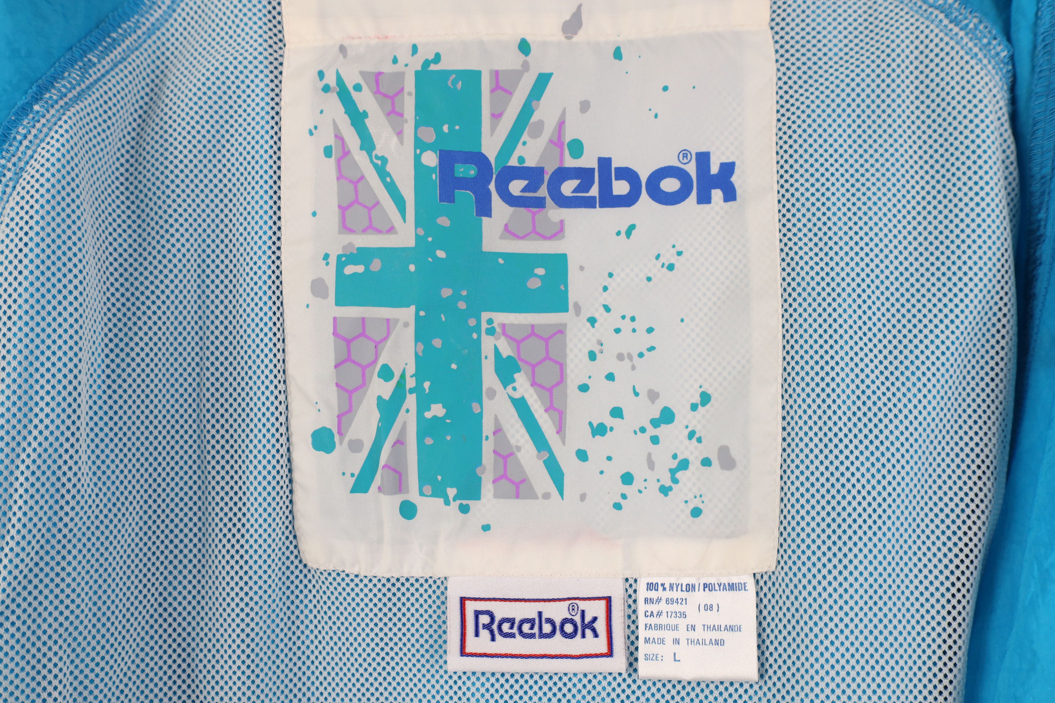 Reebok Vintage 90s Reebok Spell Out Hooded Windbreaker Jacket Size L / US 10 / IT 46 - 12 Thumbnail