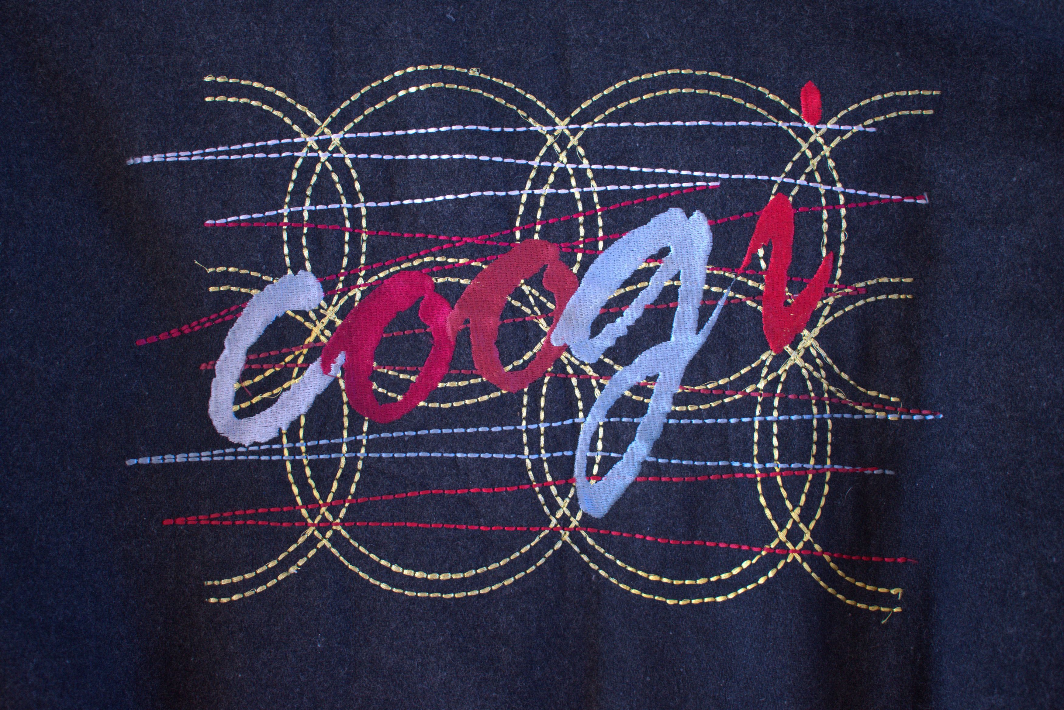 Coogi leather sleeved wool varsity jacket