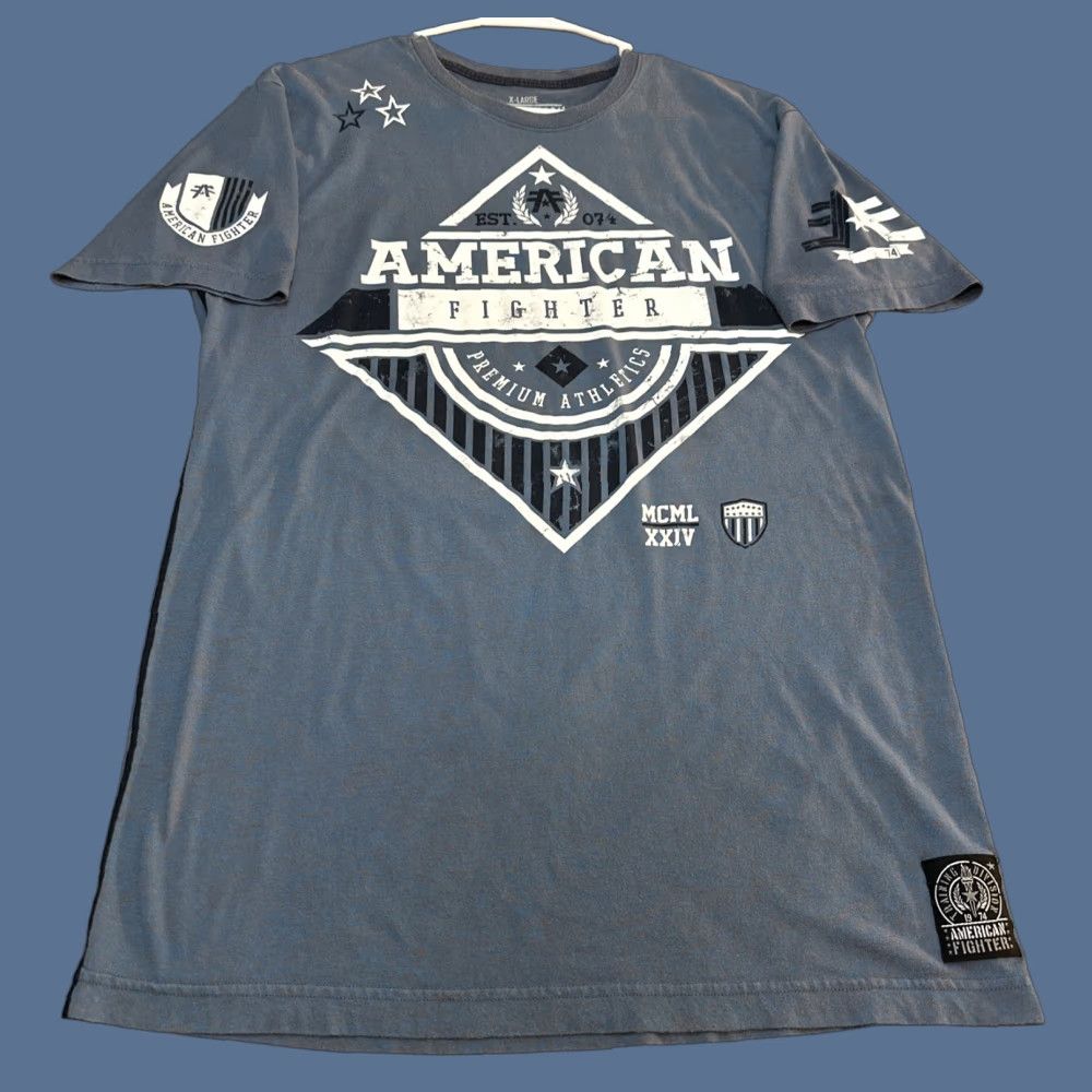 Vintage American Fighter Buckle Mens Tee Shirt XL Blue MMA UFC Distressed Look Shirt Mens XL Blue Graphic Print 90s? Size US XL / EU 56 / 4 - 1 Thumbnail