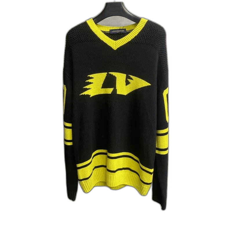 louis vuitton's new black and yellow knit logo sweater
