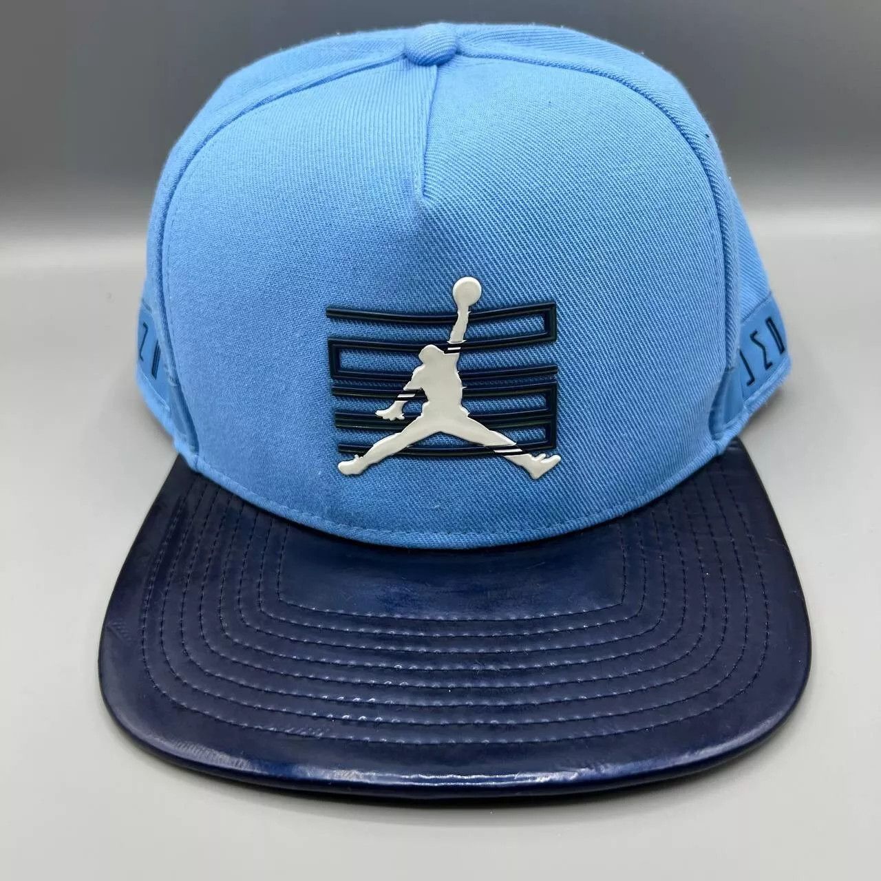 Jordan Brand Air Jordan 11 Hat Men Win Like 96 Jumpman Snap Back Cap UNC Size ONE SIZE - 1 Thumbnail