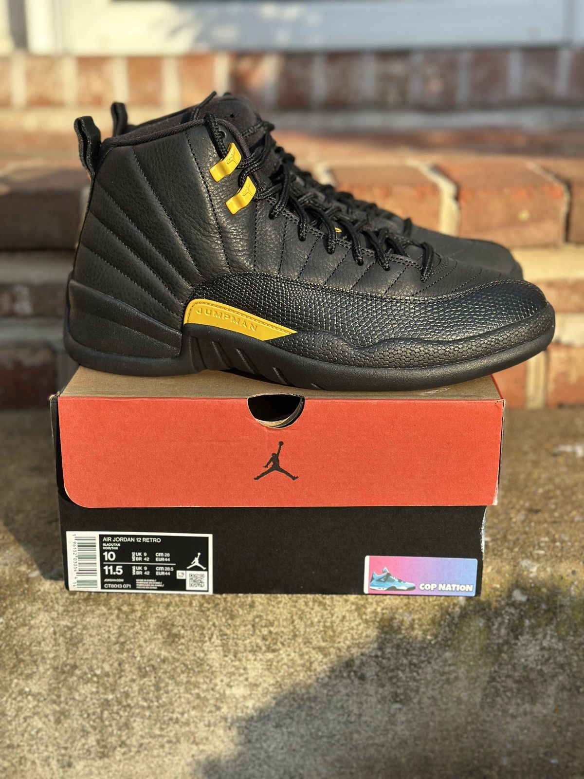 Jordan Brand Nike Air Jordan 12 Retro Black Taxi (10M) Size US 10 / EU 43 - 1 Thumbnail