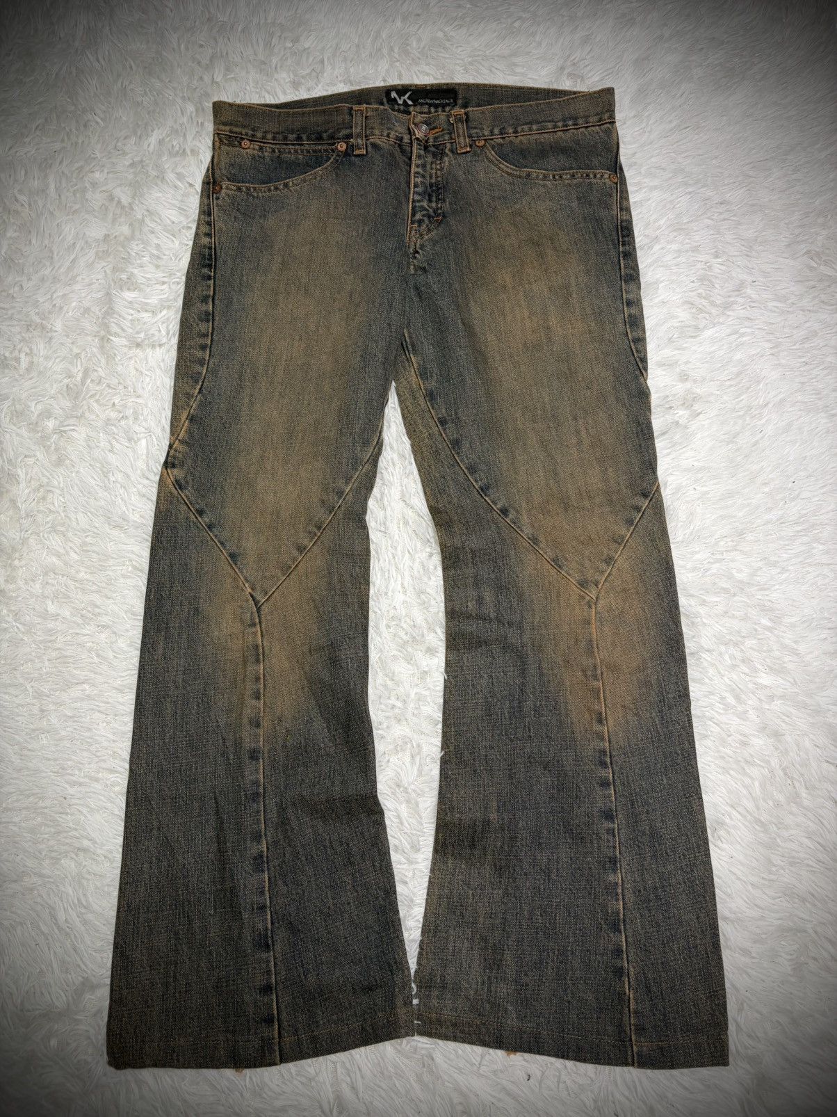 Rare Andrew Mackenzie sword knee fringe flared jeans