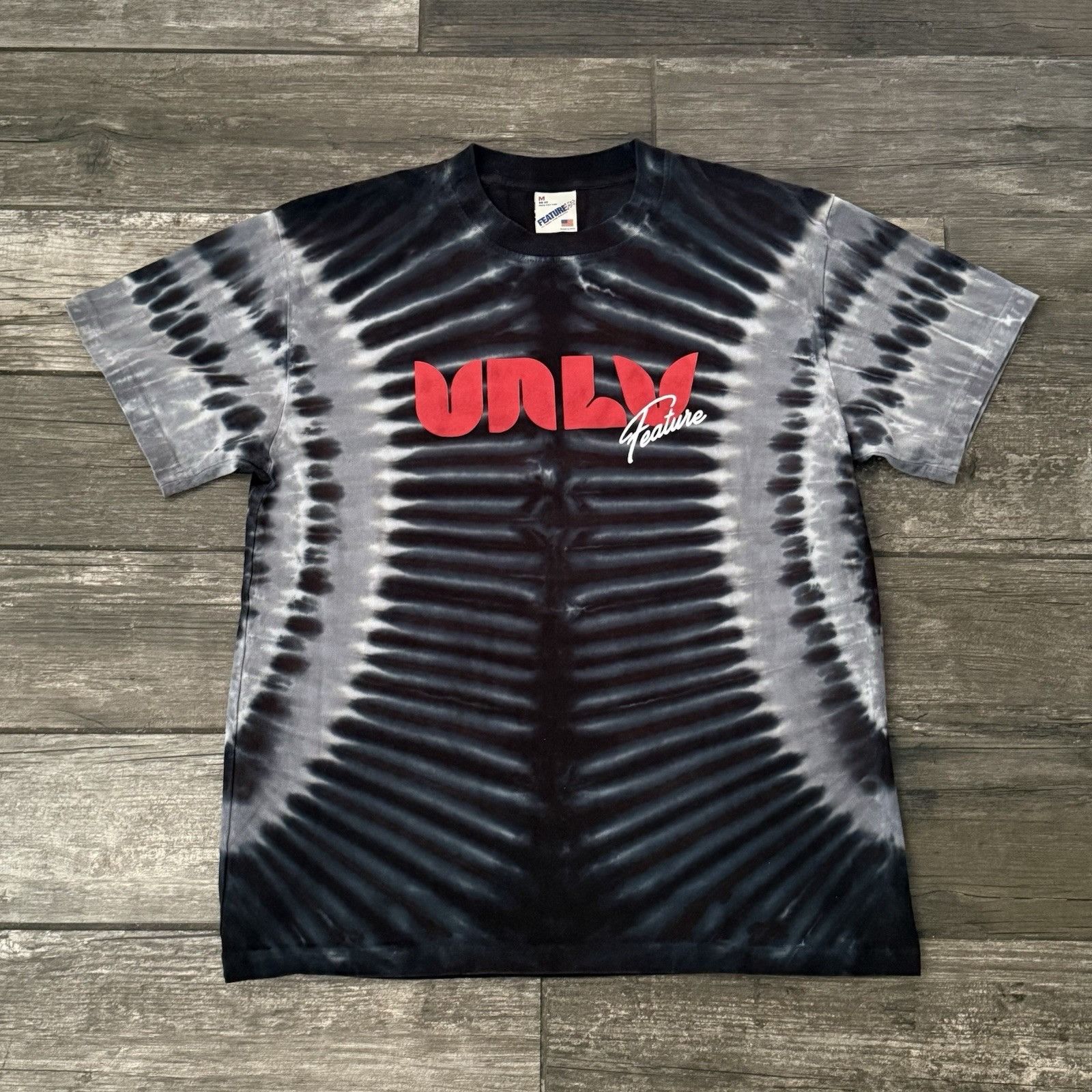 Feature FEATURE UNLV RUNNIN' REBELS PSA TEE BLACK GREY TIE-DYE SHORT Size US M / EU 48-50 / 2 - 6 Thumbnail