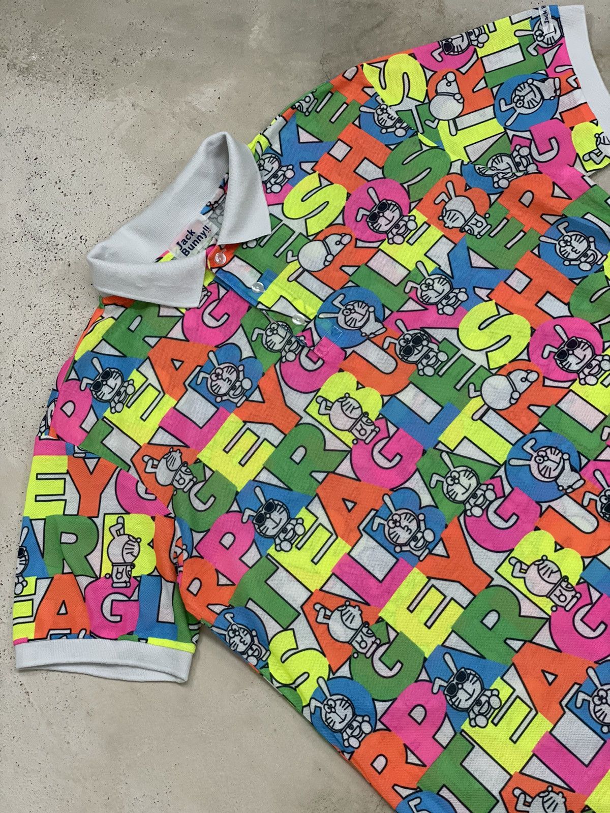 Anime × Japanese Brand × Psycho Bunny Jack Bunny Doraemon Polo Fullprint Wording Colorful Size US L / EU 52-54 / 3 - 3 Thumbnail