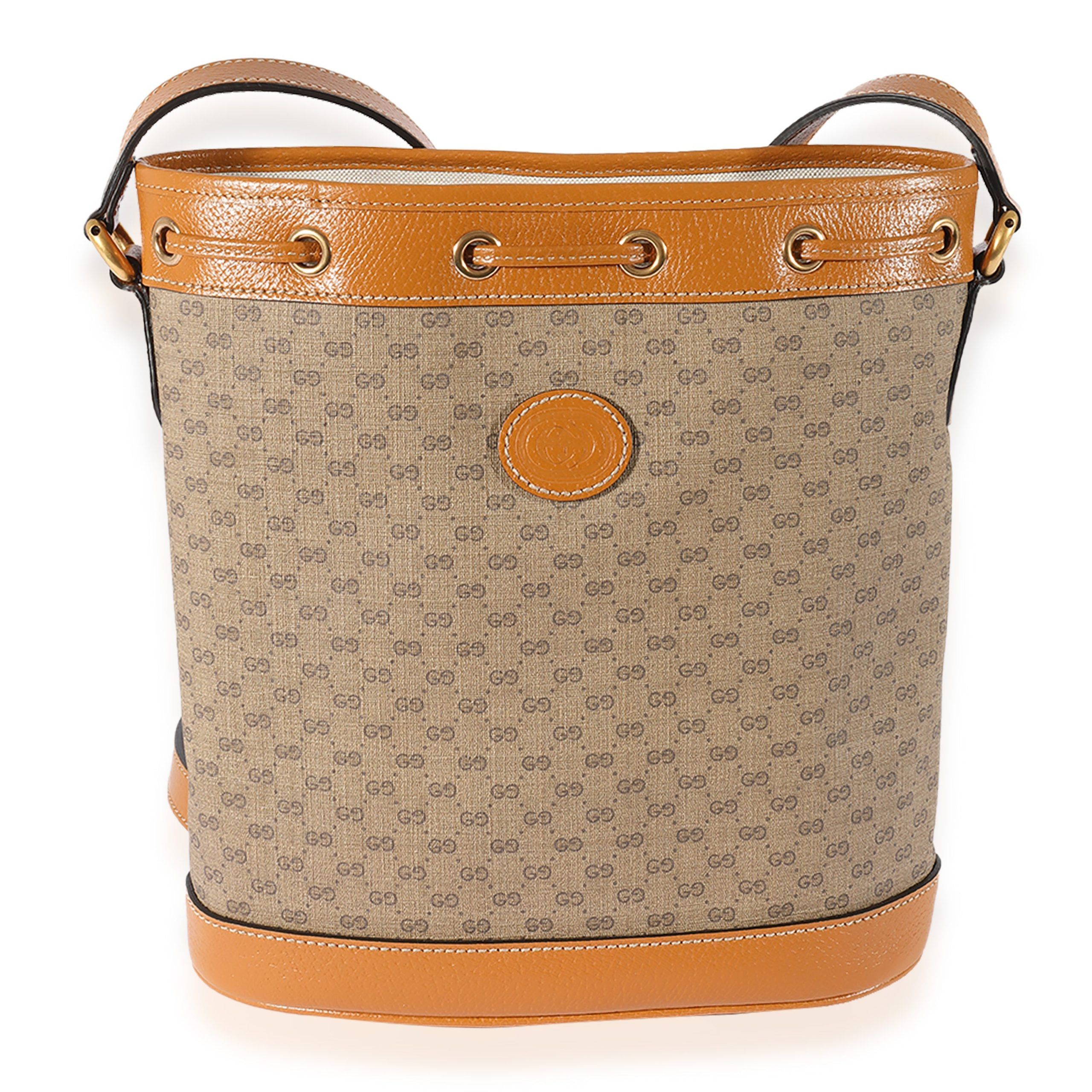 image of Gucci X Disney Vintage GG Supreme Mickey Mouse Bucket Bag in Brown, Women's