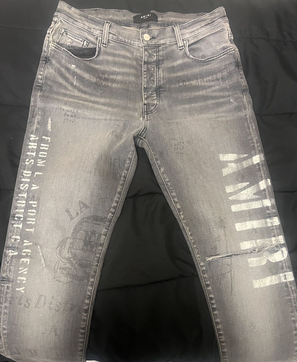 Amiri Stencil logo stretch denim jeans