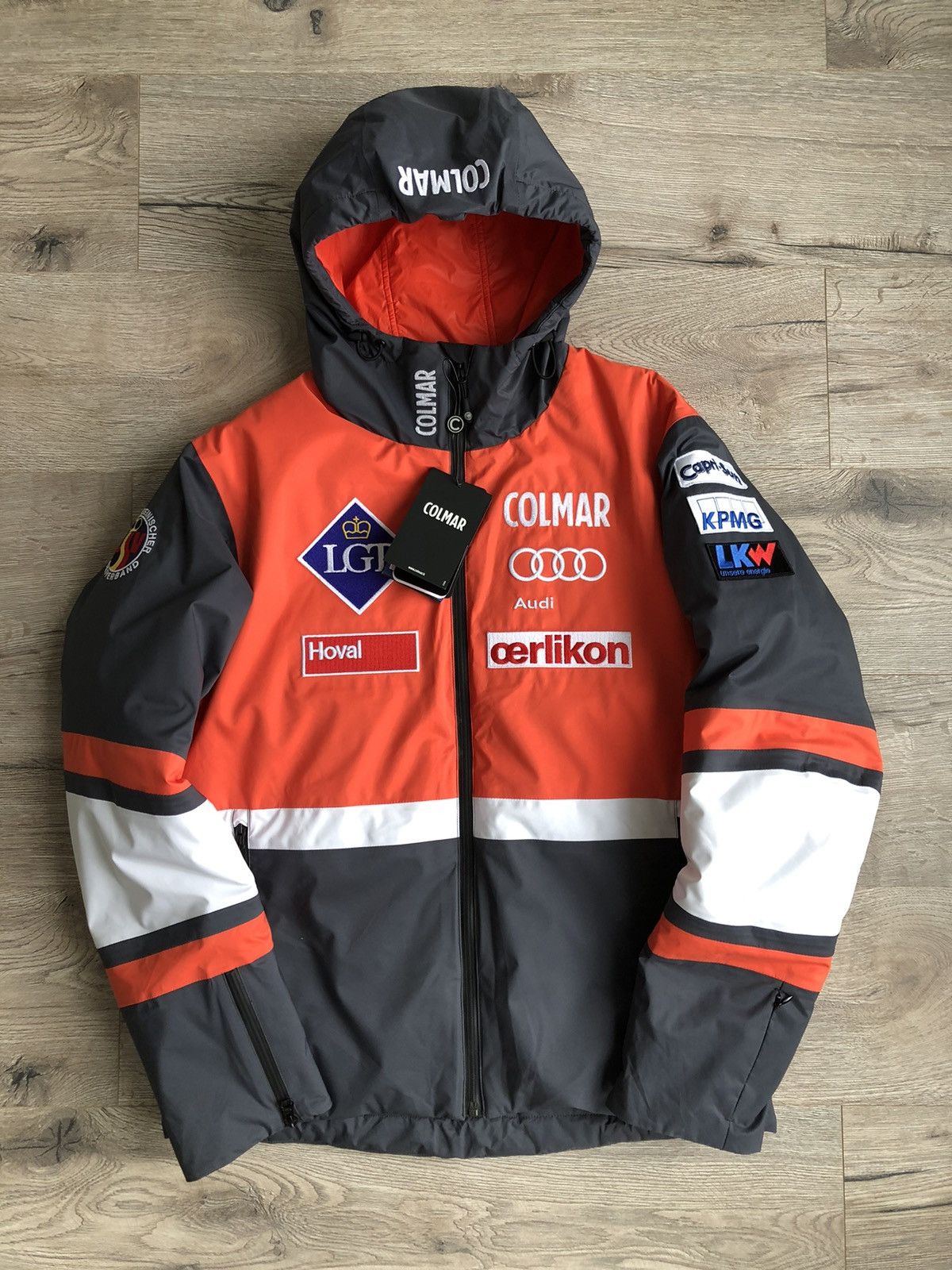 image of Colmar Liechtenstein Ski Team Jacket in Grey Orange, Men's (Size Small)