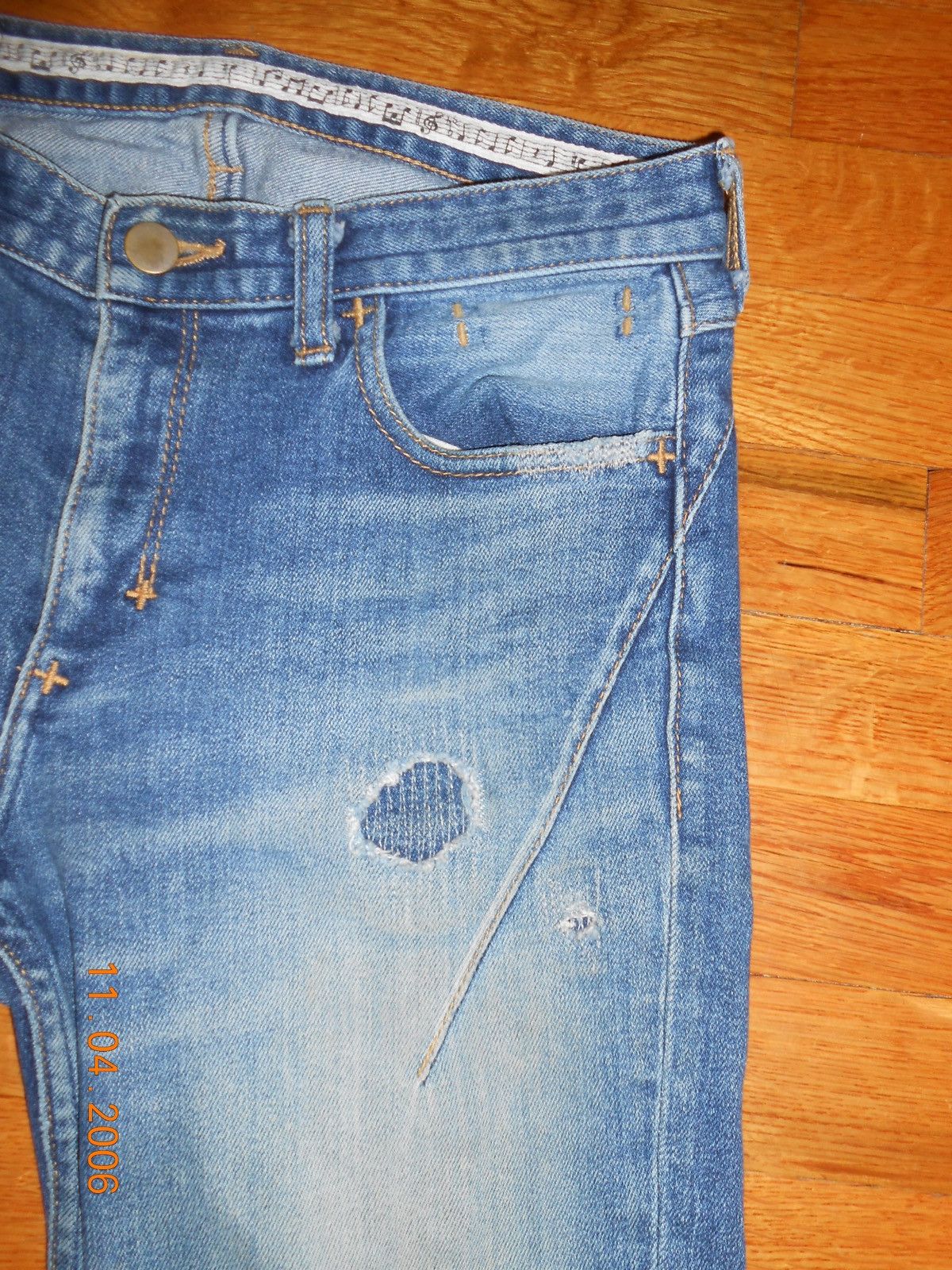 number (n)ine distressed repair denim