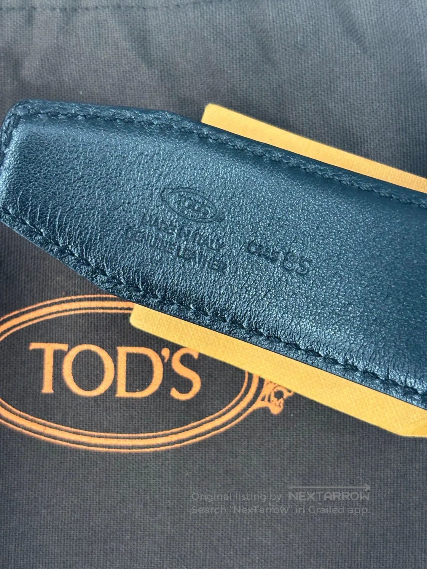 Tod's Black Leather Belt with Gold Logo.