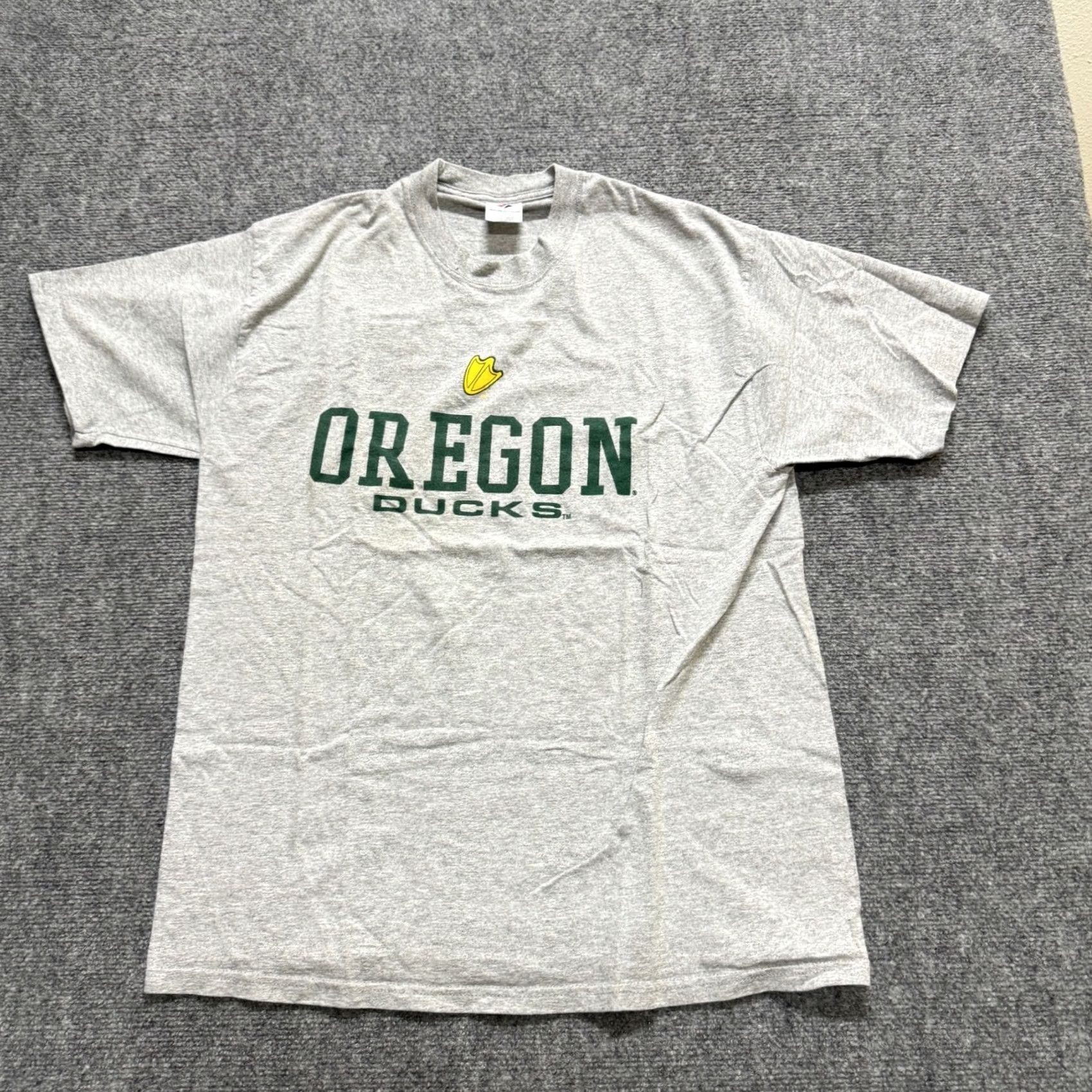 Jerzees Oregon Ducks T-Shirt Jerzees Heavyweight Cotton Blend Gray XL Men Reach XL Gray T-Shirt Oregon Ducks Mens Jerzees Heavyweight Cotton Blend Gray XL Size US XL / EU 56 / 4 - 6 Thumbnail