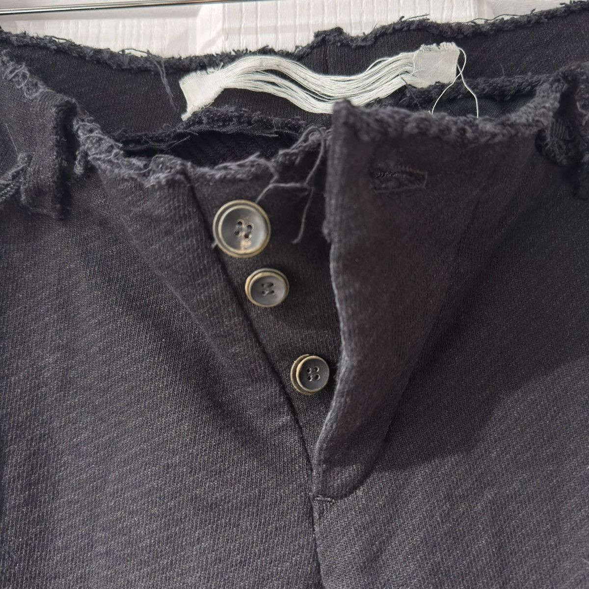 Individual Sentiments Individual Sentiments black raw-edge fitted trousers Size US 30 / EU 46 - 9 Thumbnail