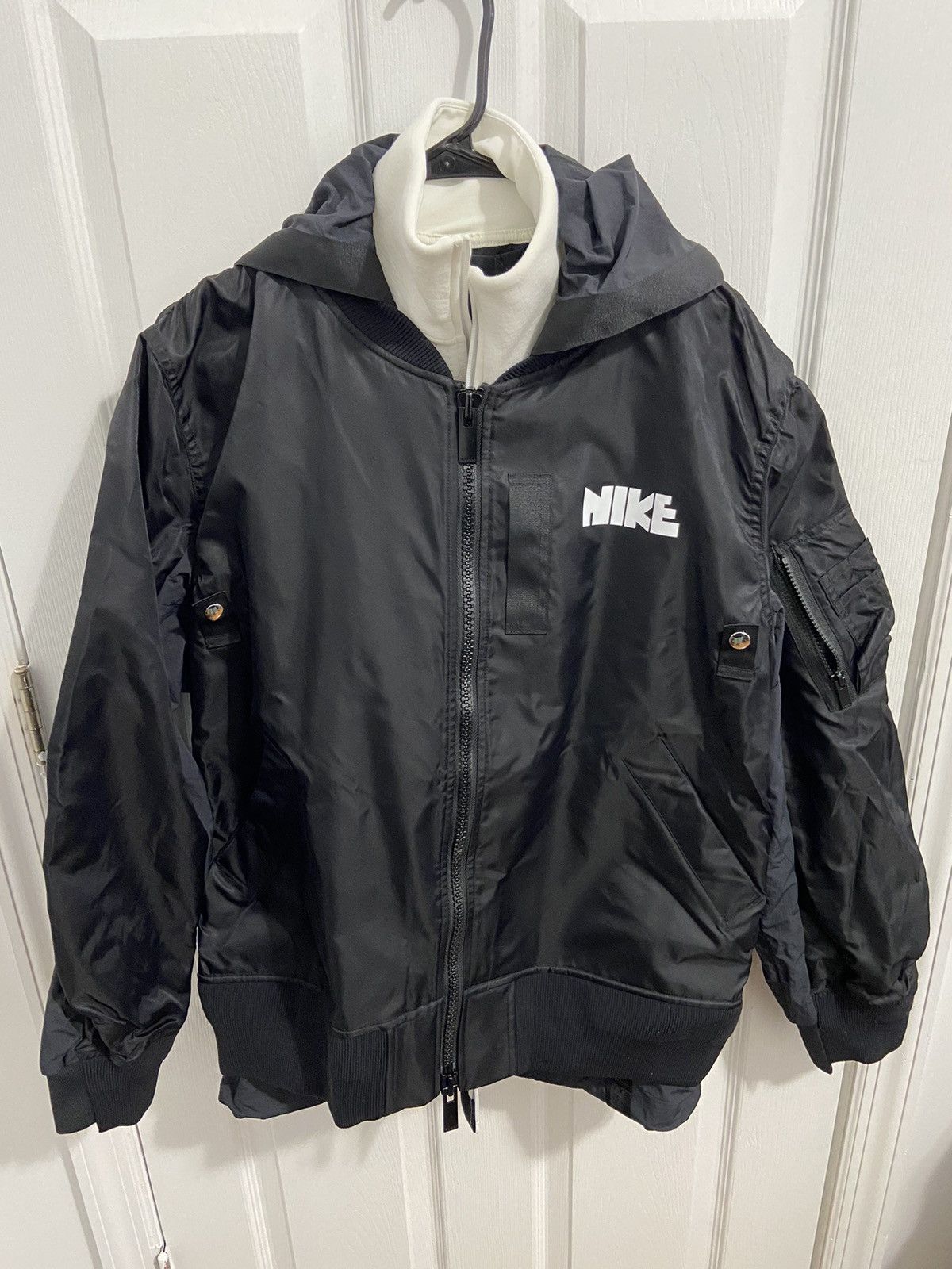 image of Nike Sacai Team Usa Layered Bomber Jacket in Black, Men's (Size Large)