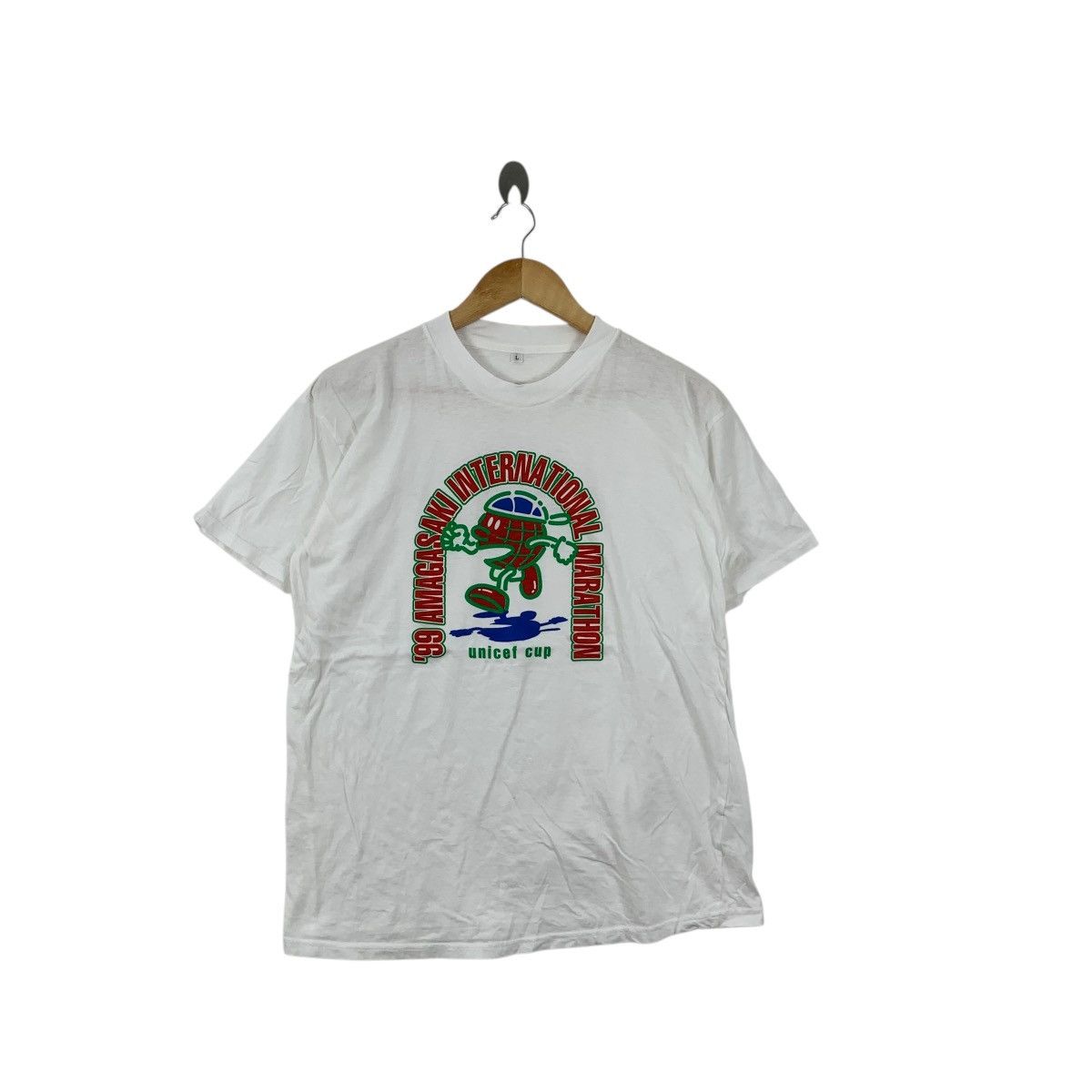 Vintage Vintage 1999 AMAGASAKI UNICEF MARATHON Japan Tee Shirt Top Size L / US 10 / IT 46 - 1 Thumbnail
