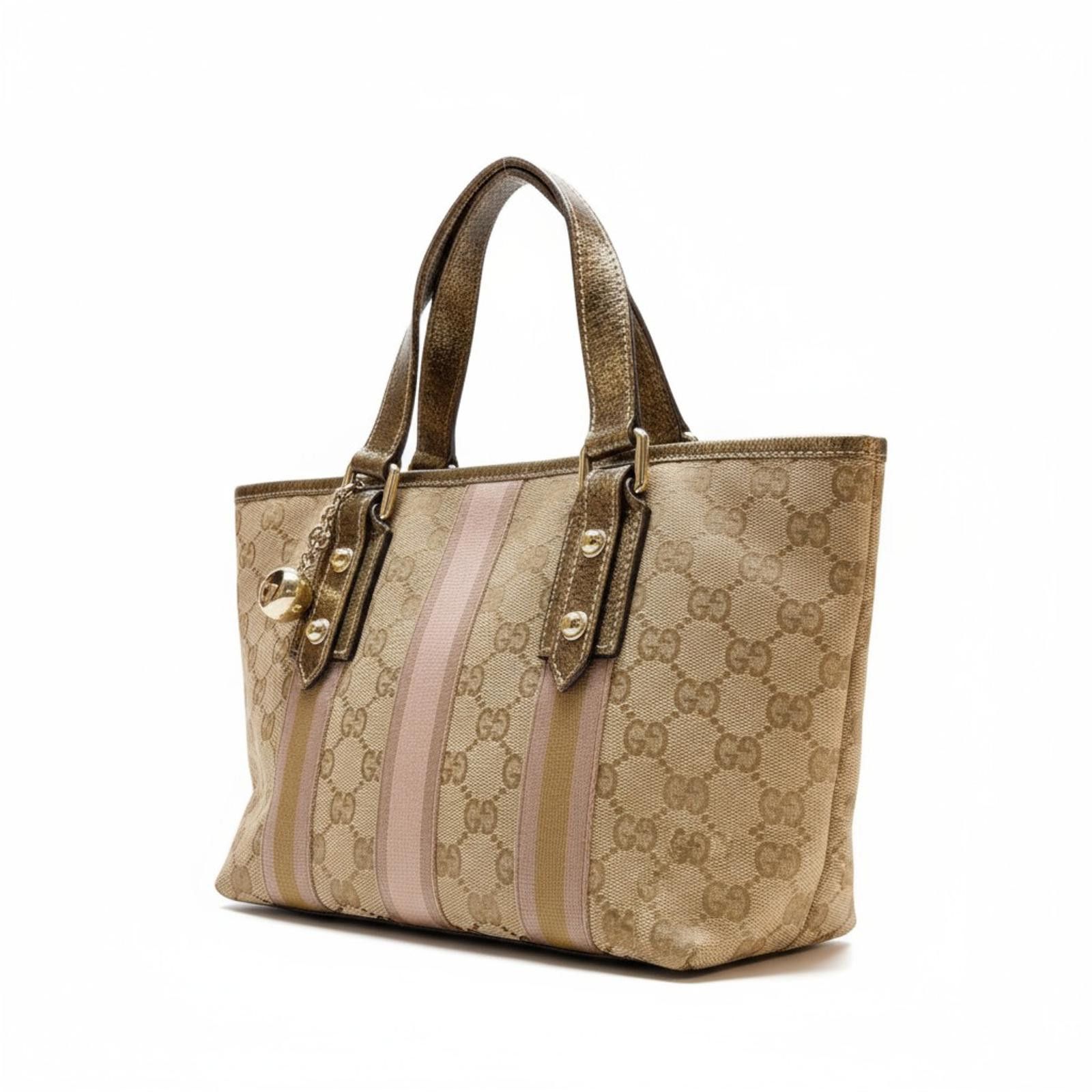 Gucci Gucci - Beige Monogram Canvas Handbag with Gold Accents Size ONE SIZE - 1 Thumbnail