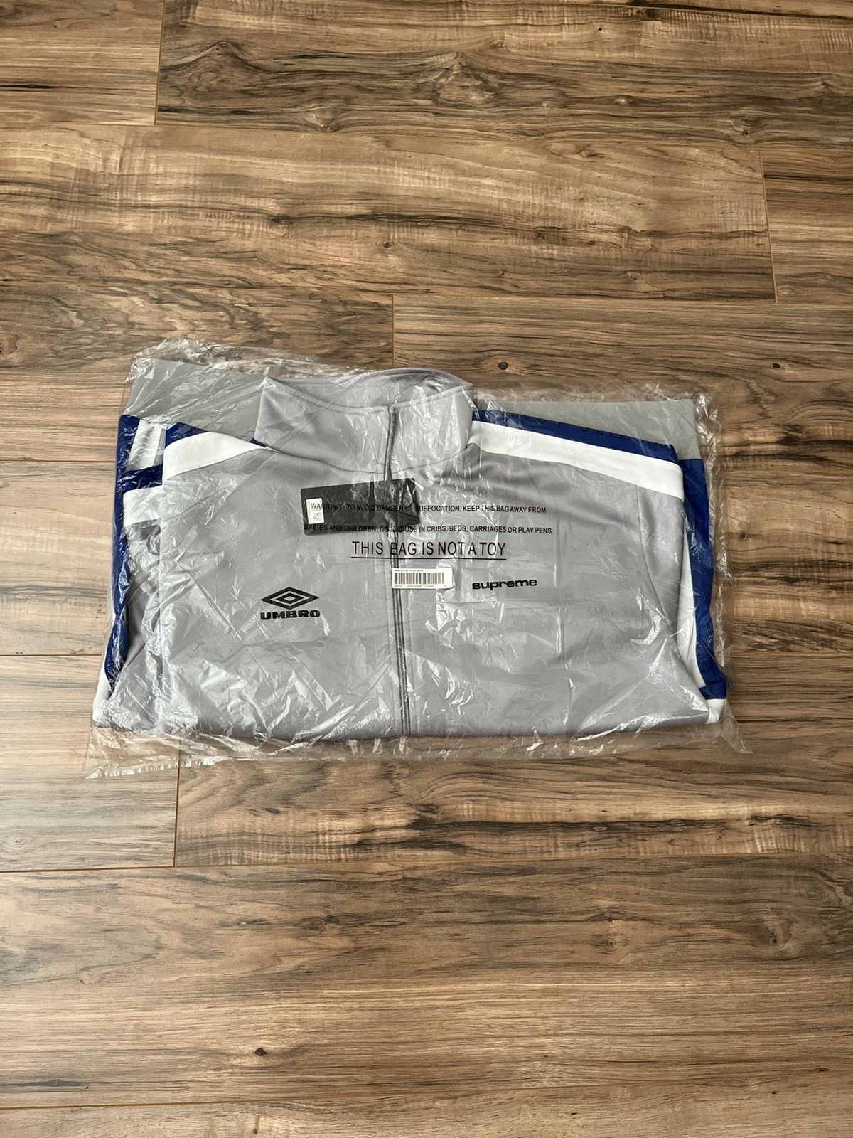 image of Supreme Umbro Snap Sleeve Jacket in Light Grey, Men's (Size XL)