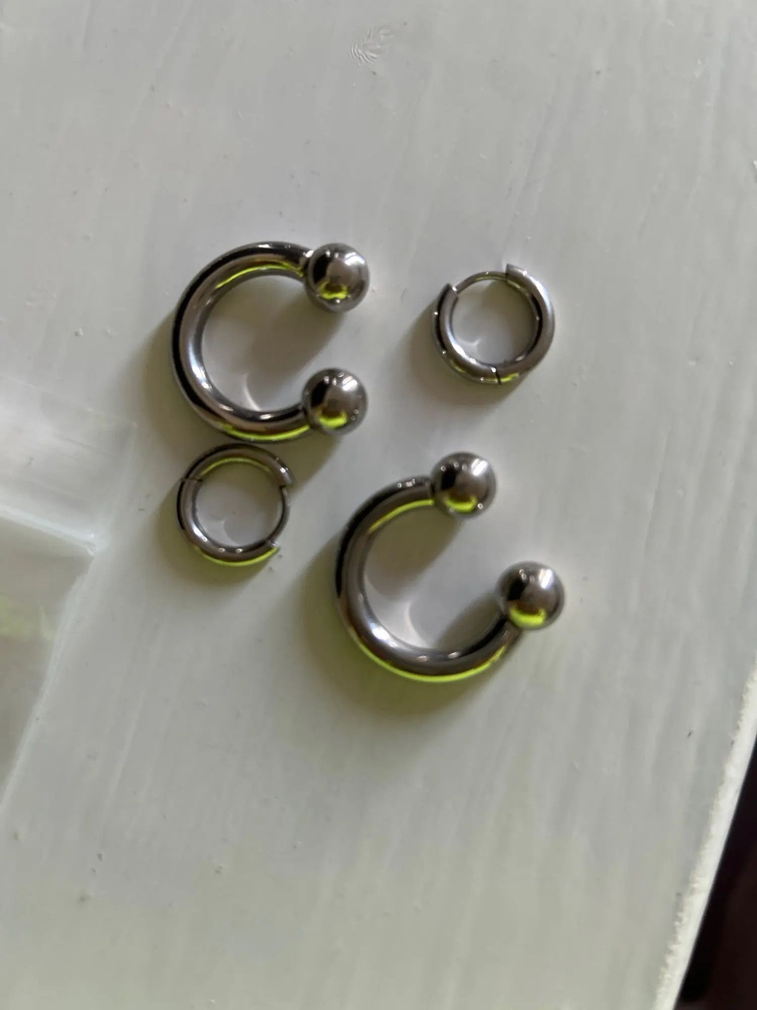 Jewelry A Pair of Horseshoe Round Beads Hollow Steel Earrings Size ONE SIZE - 2 Thumbnail