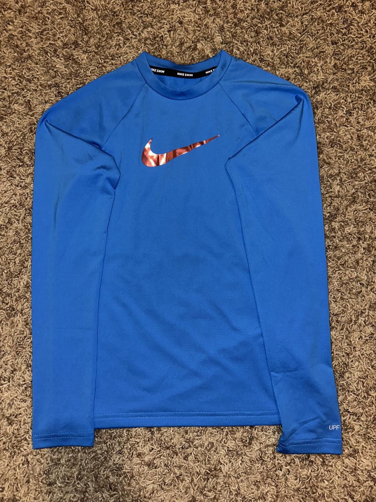 Nike Nike Big Kids (Girl’s) Essential Long Sleeve Hydroguard Blue Shirt Size XXS / US 00 / IT 34 - 1 Thumbnail