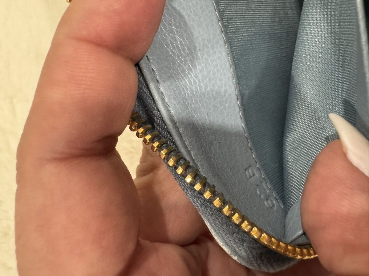 Prada light blue zippy wallet Womenswear