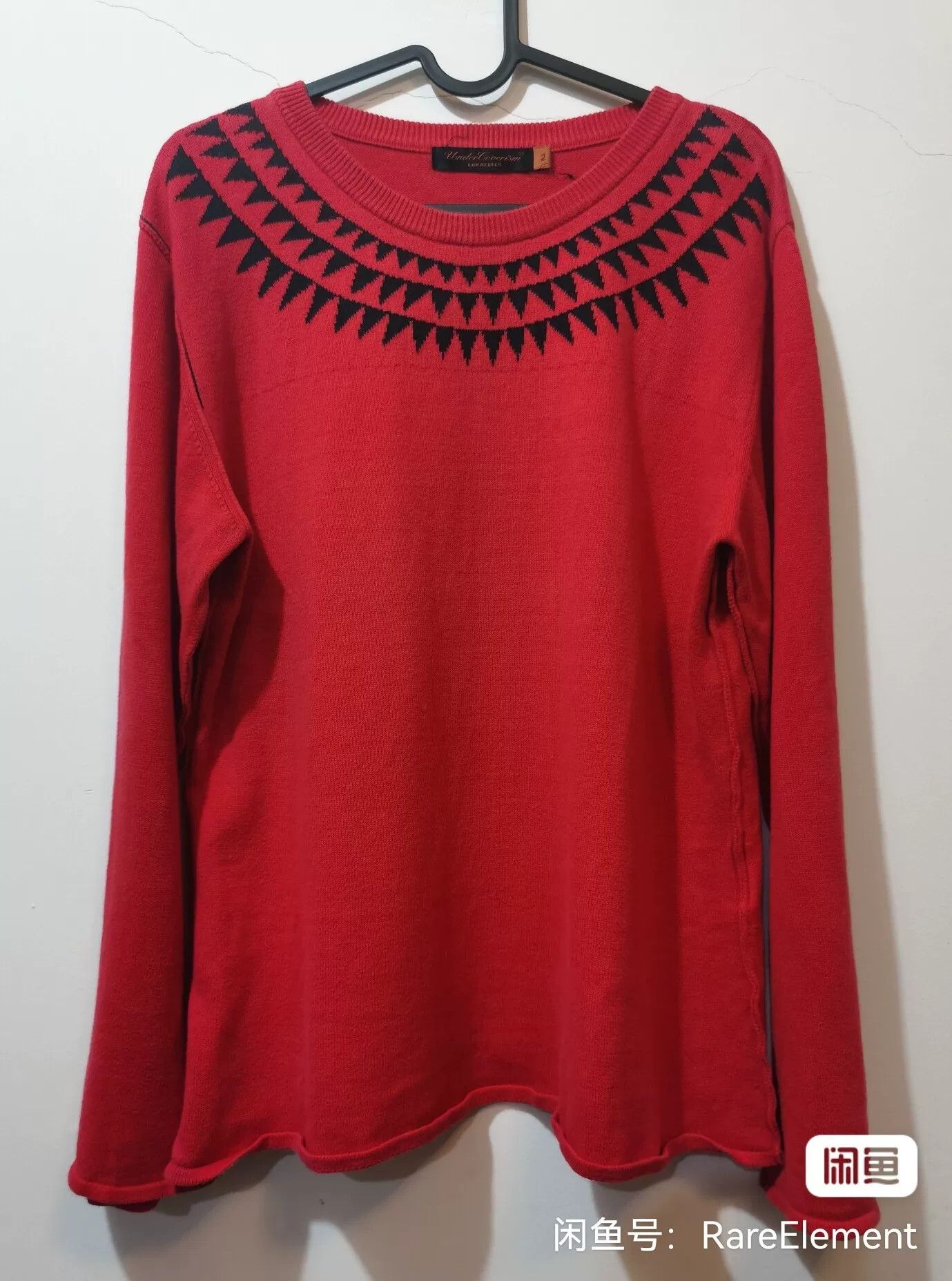 red long sleeve knit sweater with zigzag design