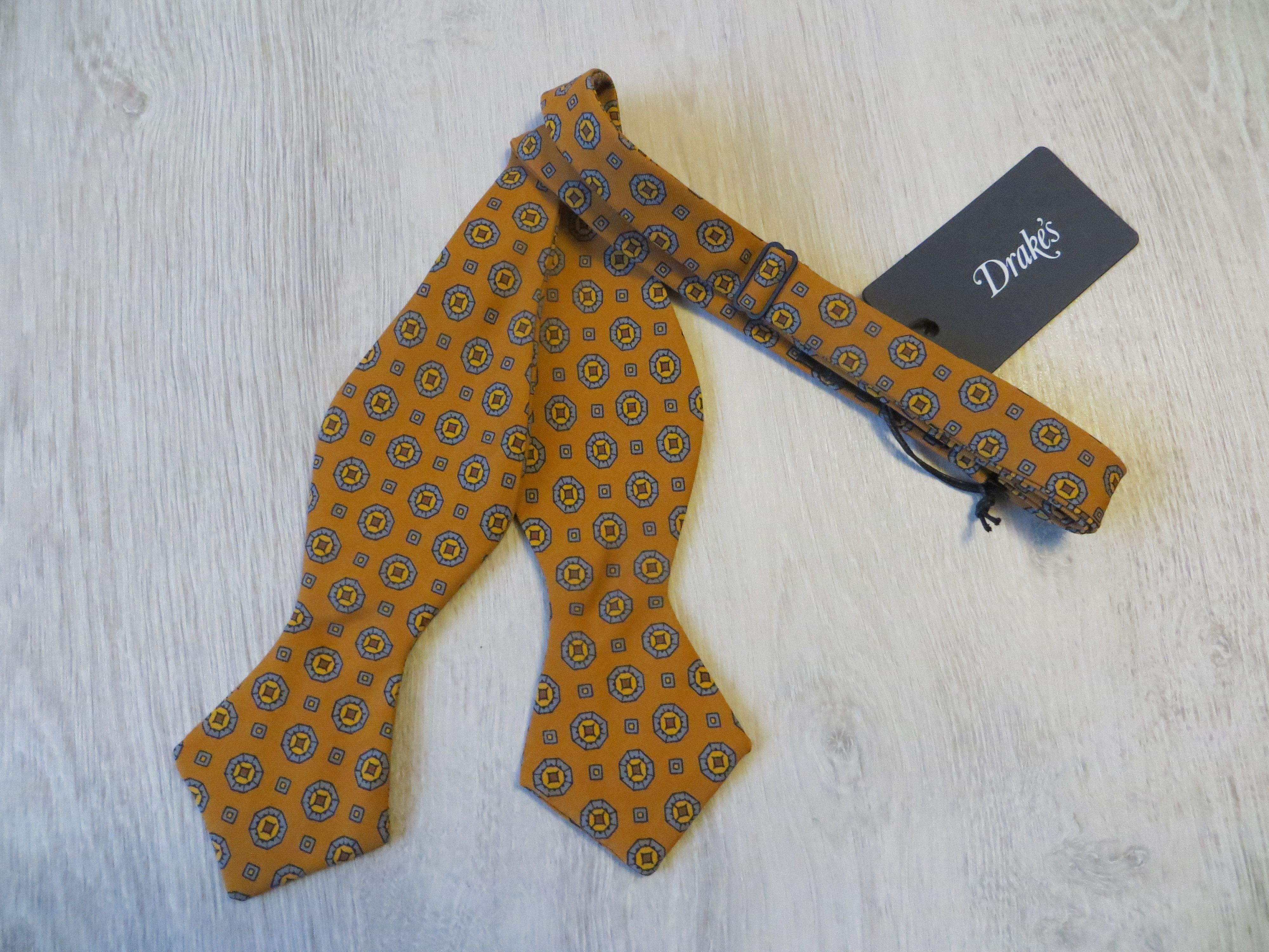 Drakes DRAKES MUSTARD PAISLEY FLORAL BOW TIE | Grailed