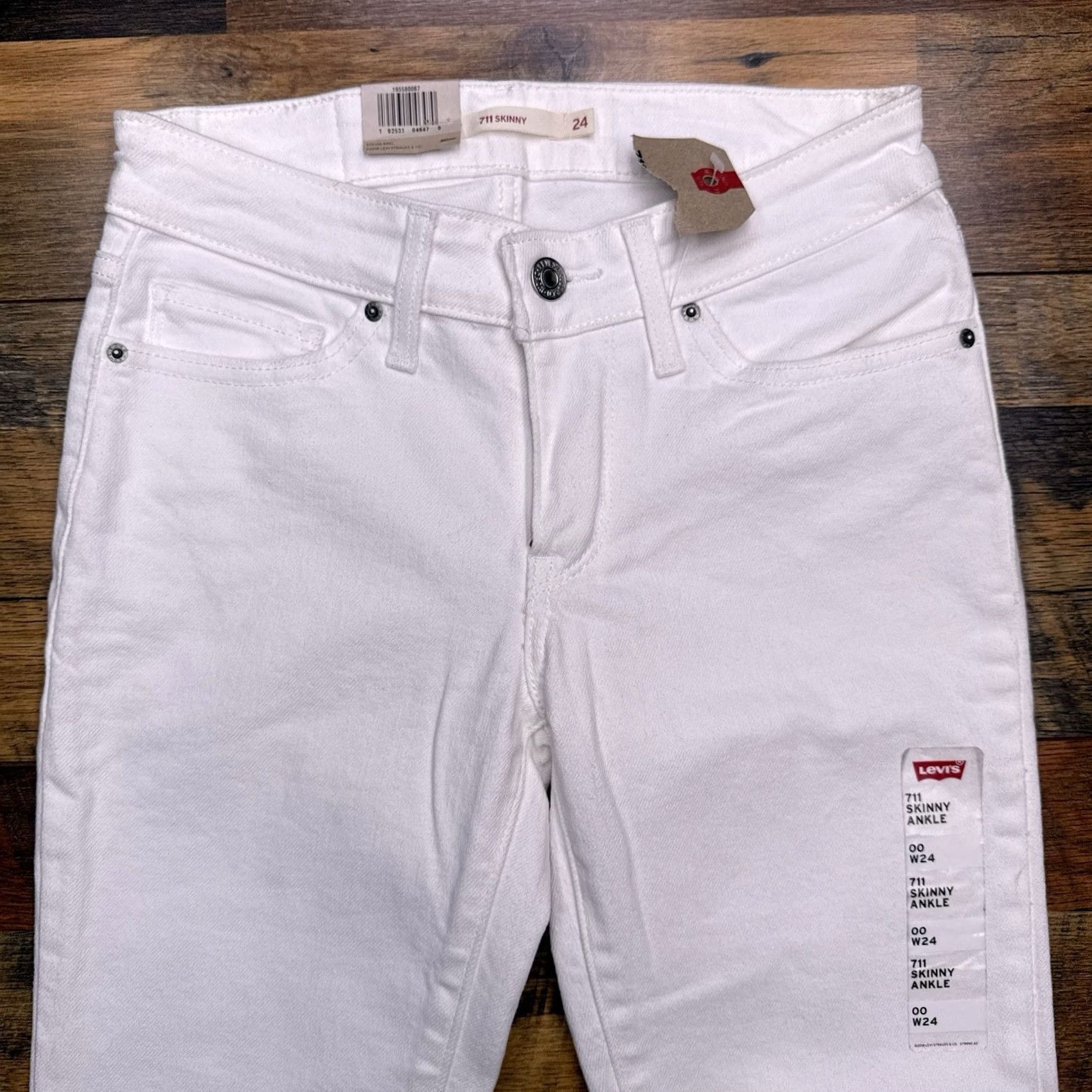 Levi's VINTAGE? No. Levi's 711 Skinny Jeans Womens 24 White Mid Rise Stretch Denim 5-Pocket Slim 26in Inseam Size 42" / US 20 - 2 Thumbnail