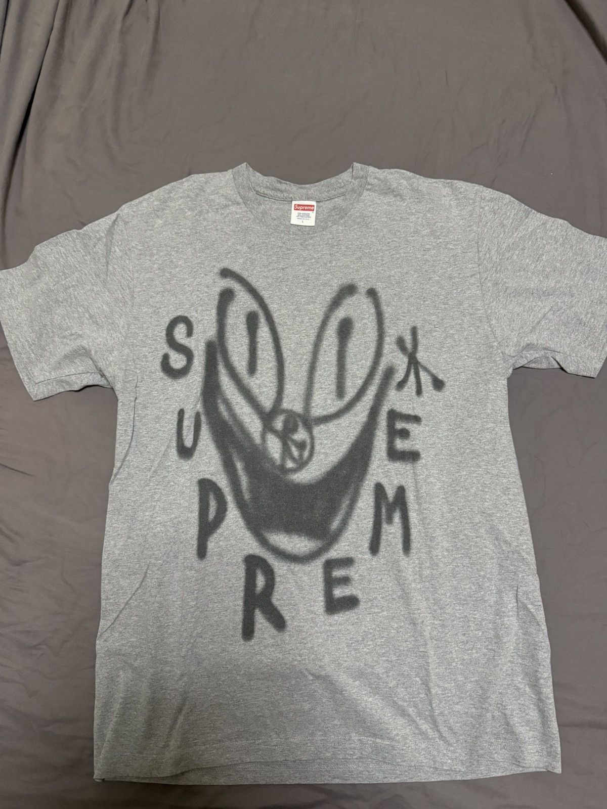 Supreme Smile Tee (FW18) - $36