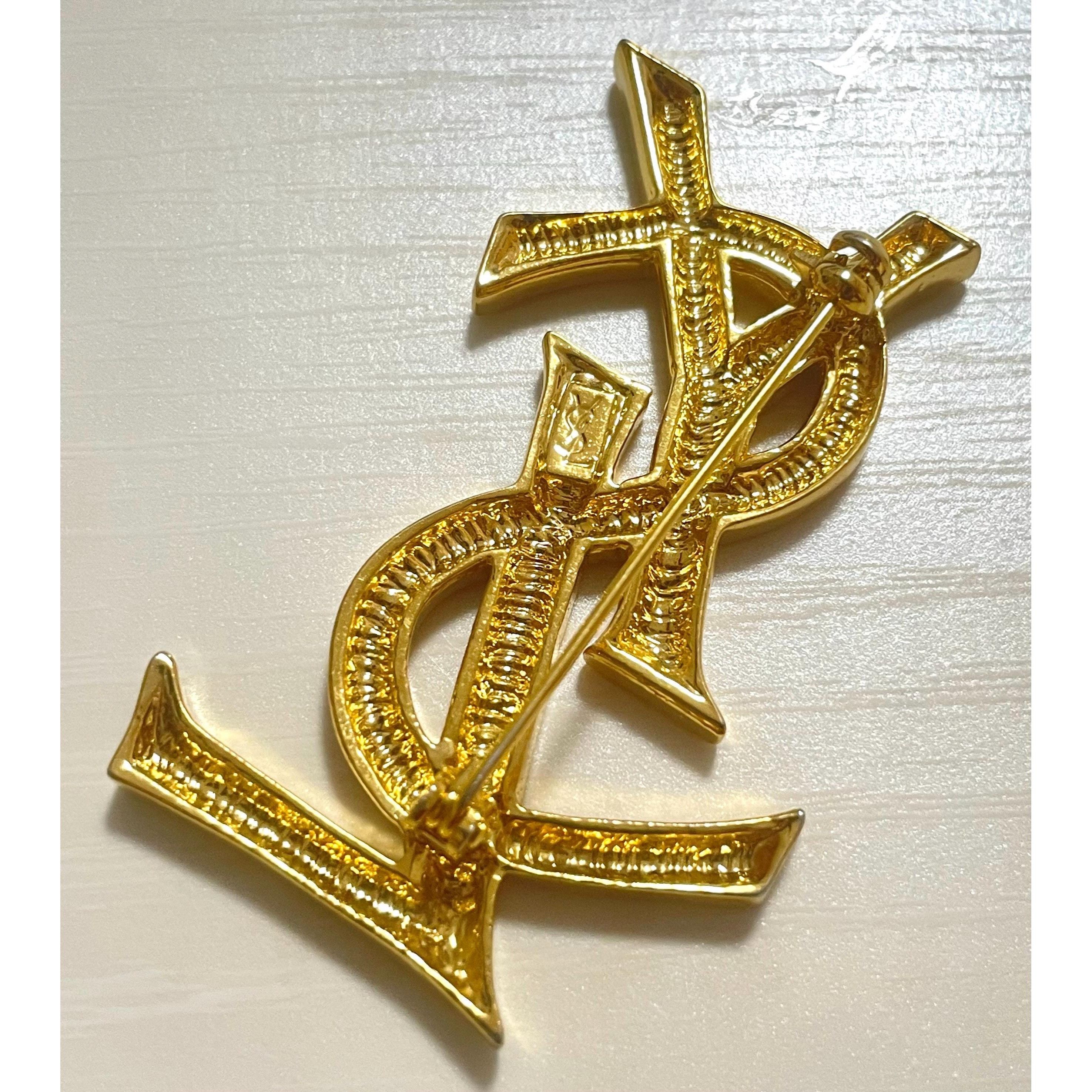Yves Saint Laurent Vintage Yves Saint Laurent golden YSL logo brooch. Size ONE SIZE - 6 Thumbnail
