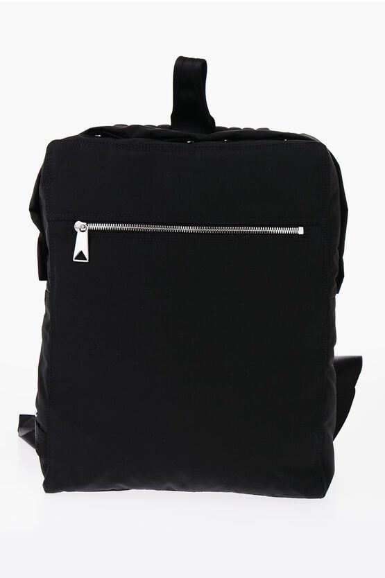 Backpack with zip and snap buttons