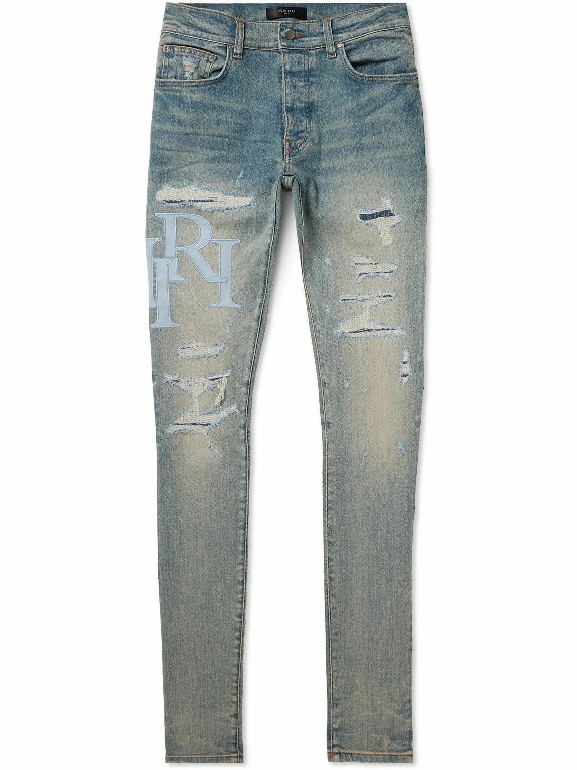 oc11z0825 Logo-Appliquéd Panelled Distressed Jeans in Blue